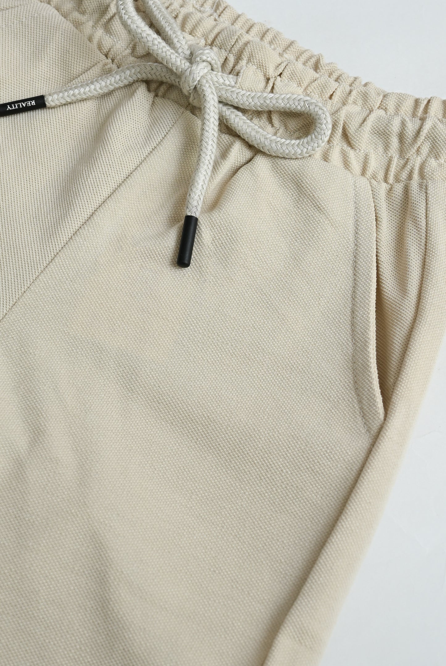 KIDS CREAM SHORTS