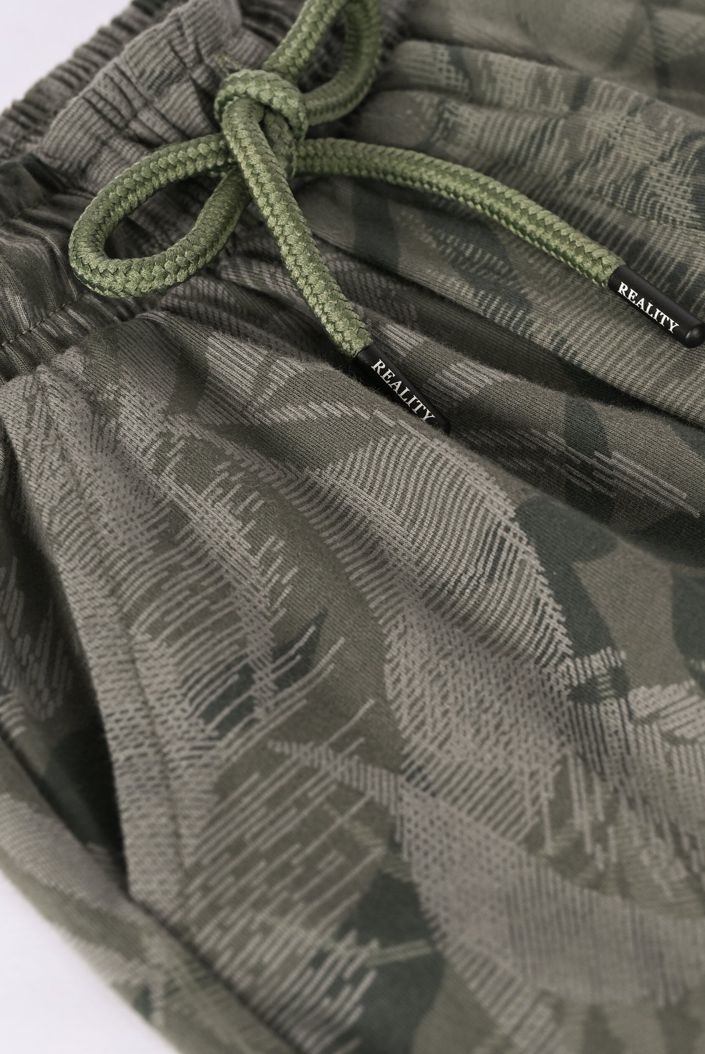 PRINTED GREEN SHORTS Reality