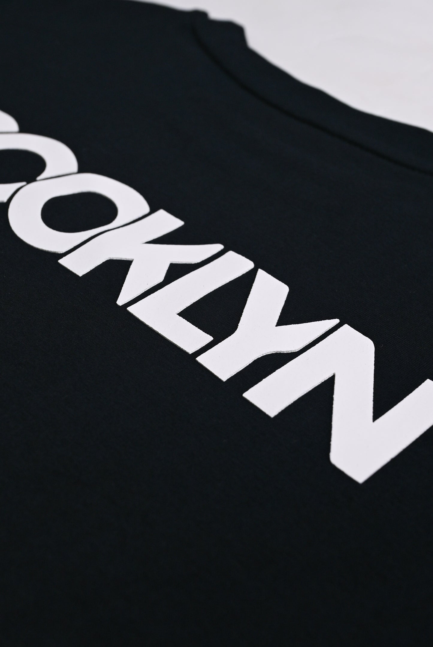 BLACK LYCRA JERSEY BROOKLYN GRAPHIC TEE Reality