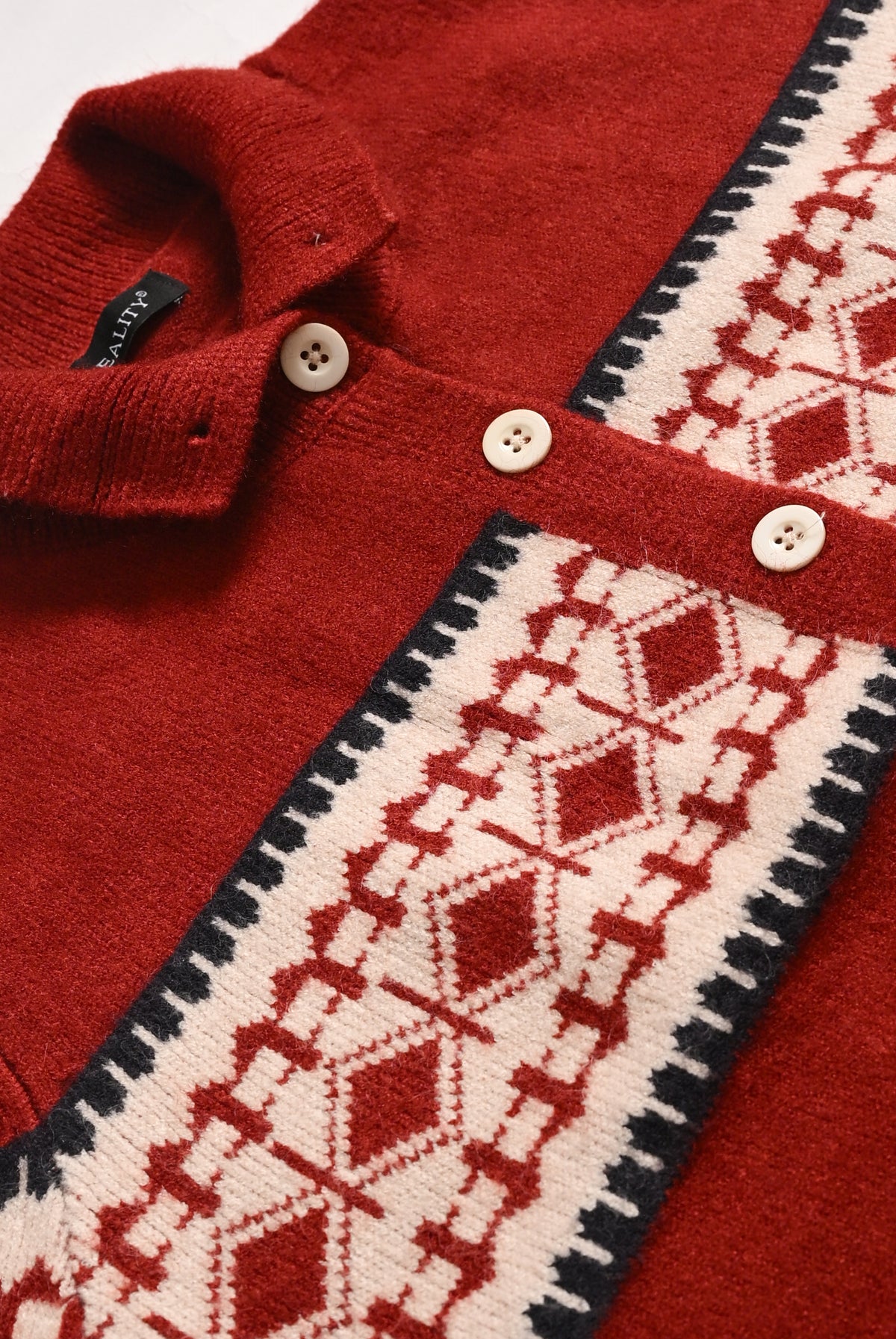 RED SWEATER Reality