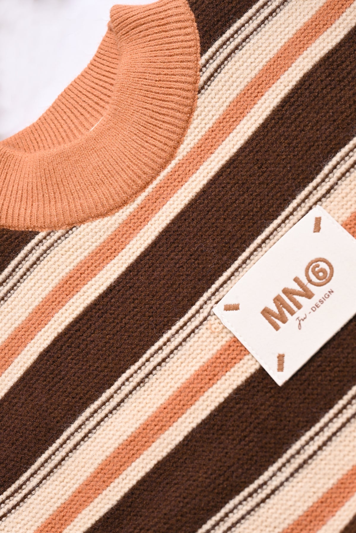 BROWN SWEATER Reality