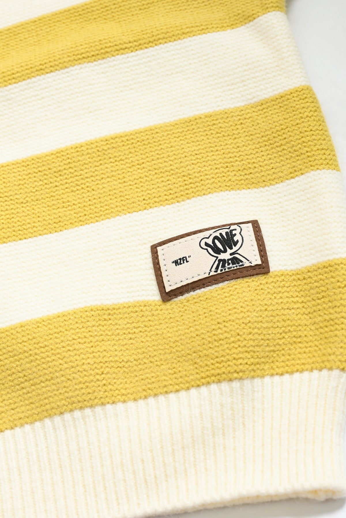 YELLOW SWEATER Reality