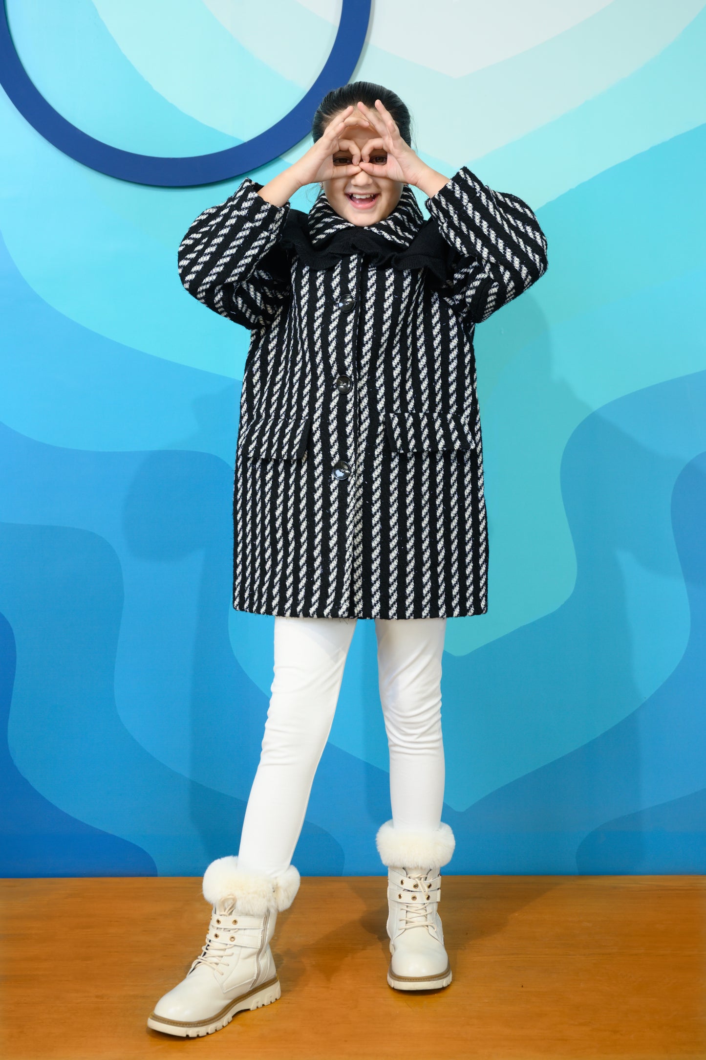 KIDS BLACK COAT Reality