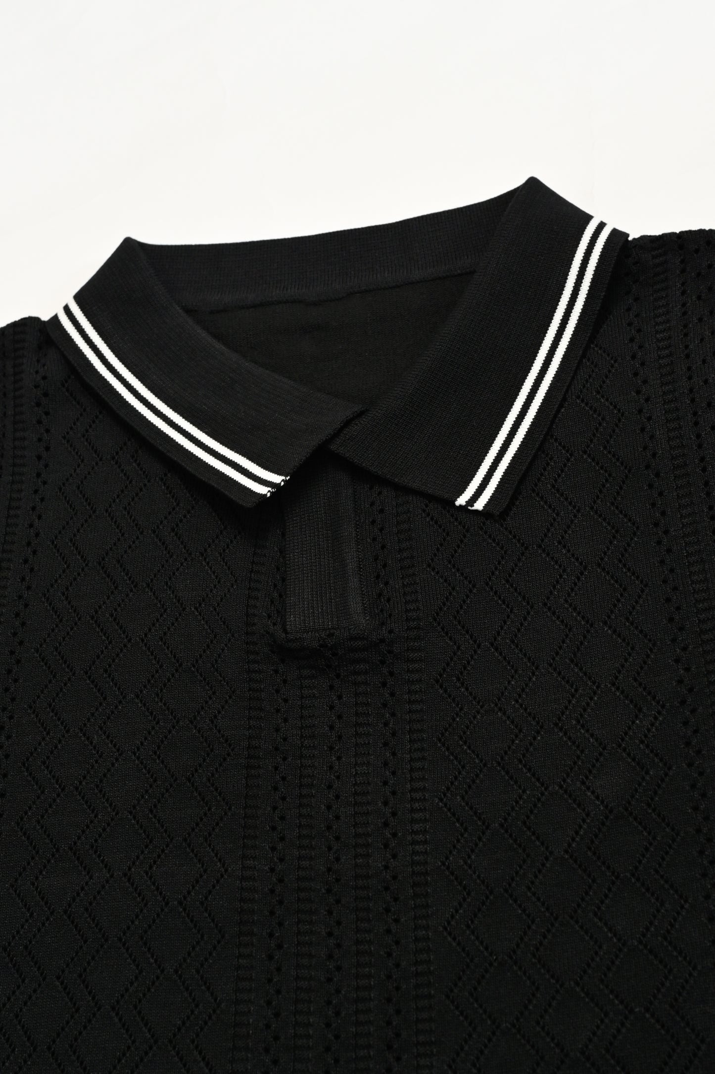 IMPORTED KNITTED BLACK POLO Reality