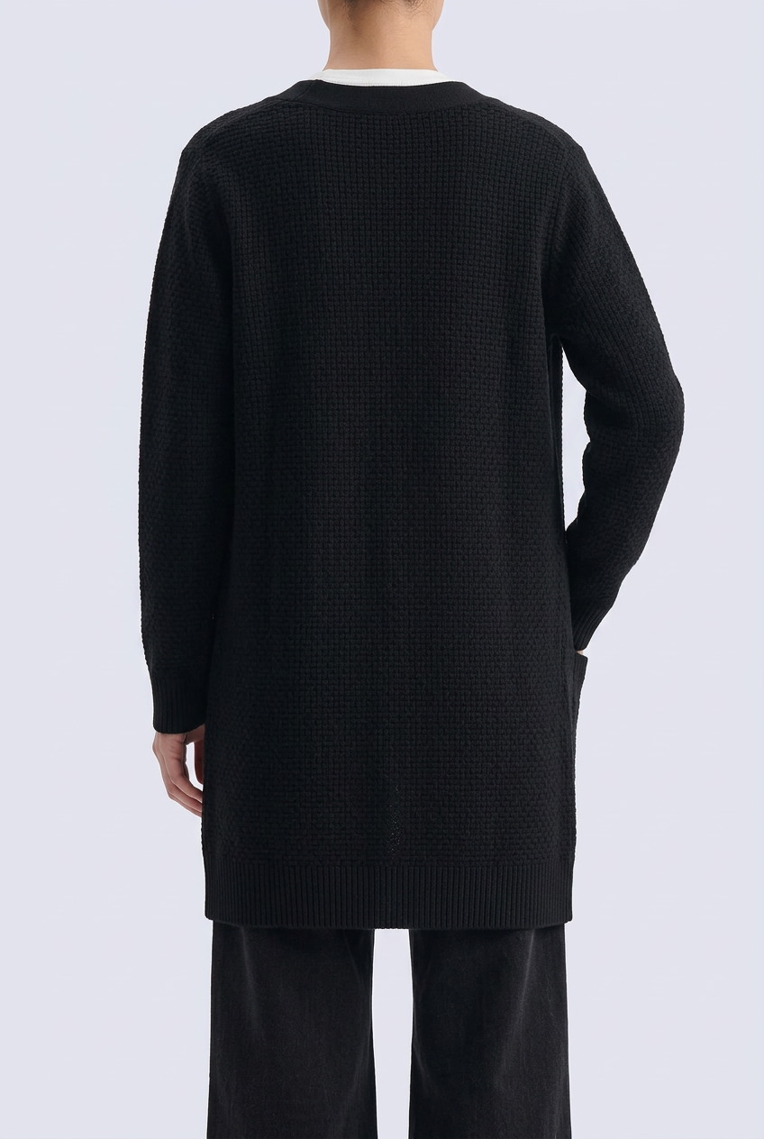 Black cardigan back pose