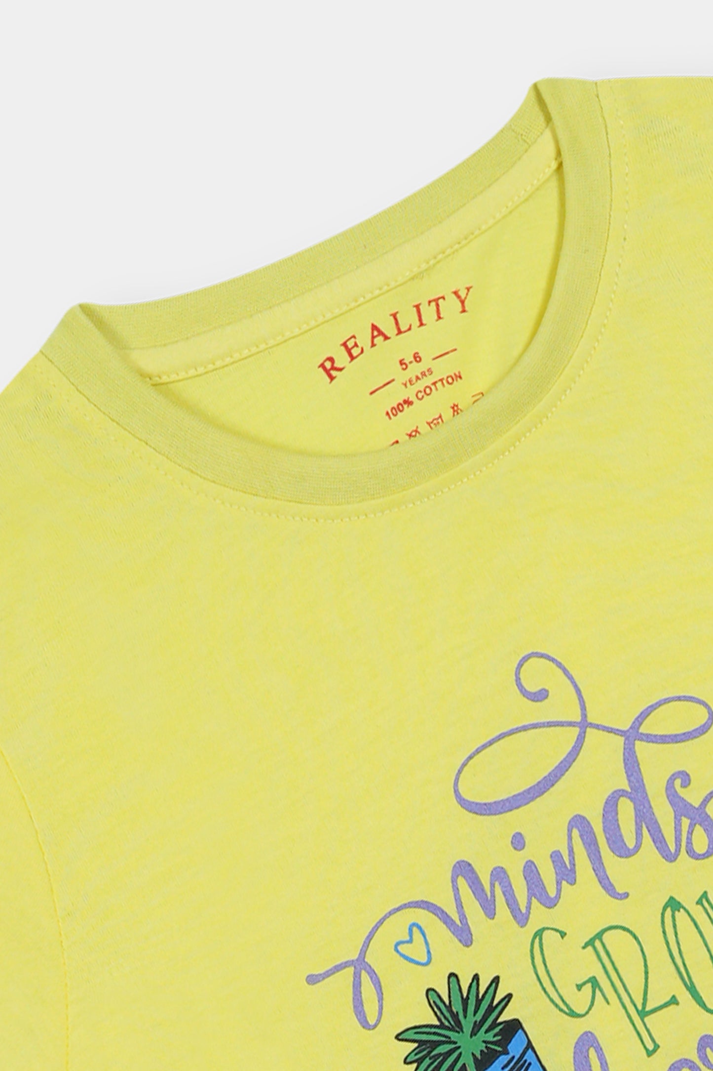 Yellow Graphic Tee – 'Minds Grow Here' with Potted Plant Design Reality