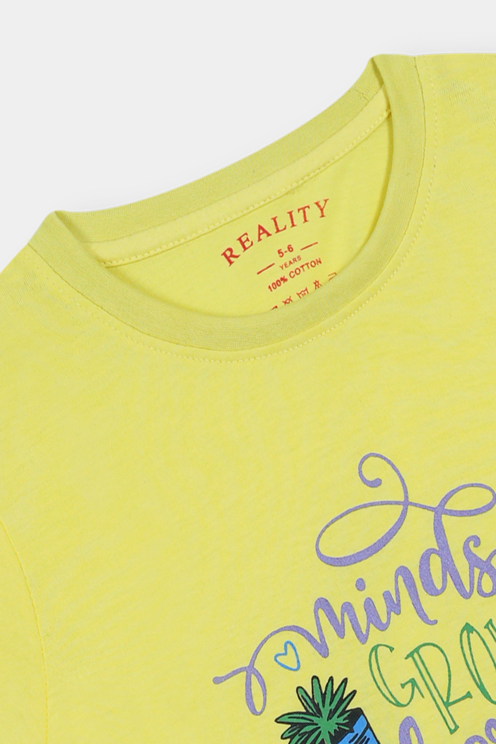Yellow Graphic Tee – 'Minds Grow Here' with Potted Plant Design Reality