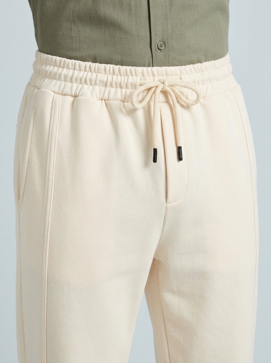 INTERLOCK TAPERED OFF WHITE TROUSER Reality