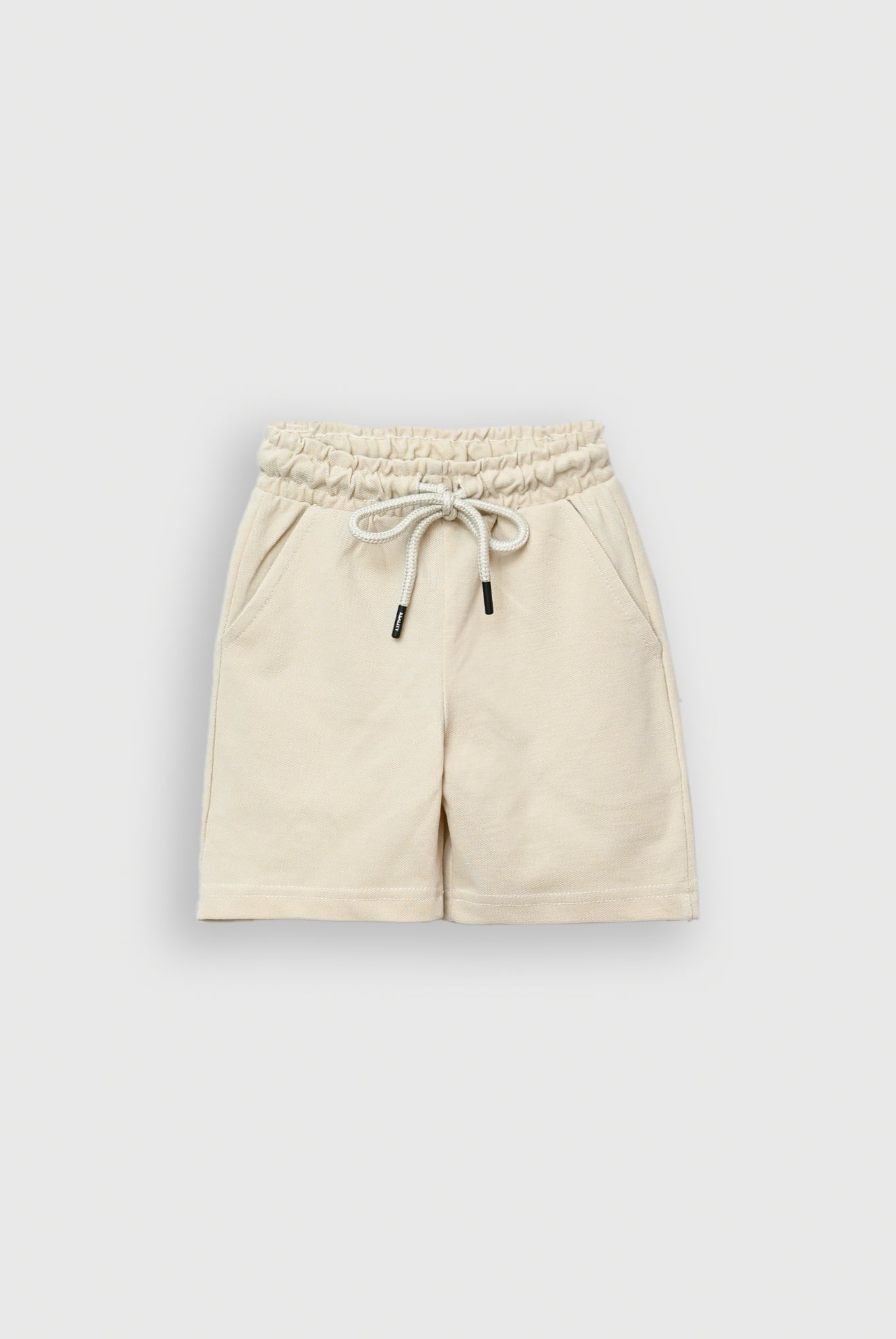KIDS CREAM SHORTS
