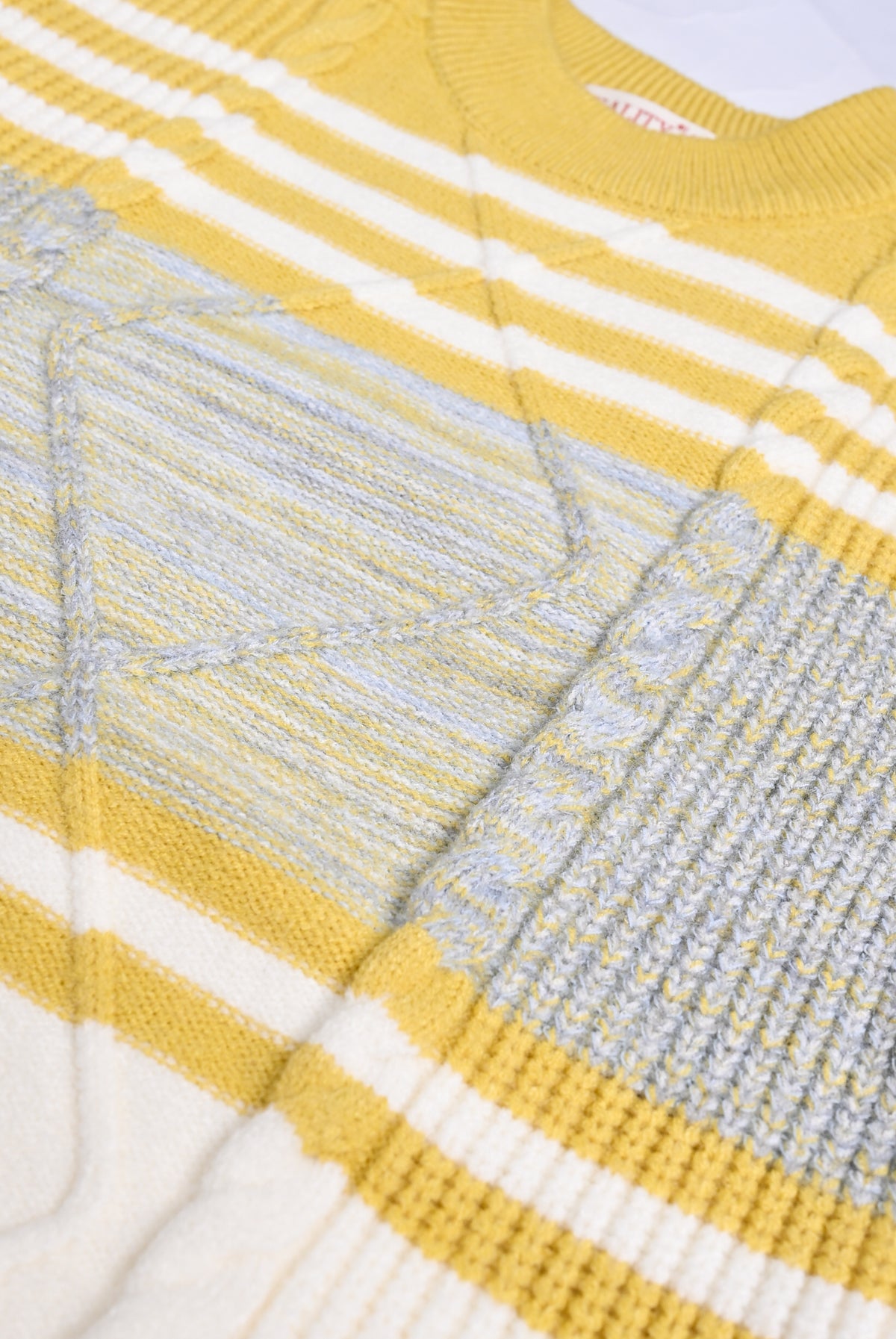 YELLOW SWEATER Reality