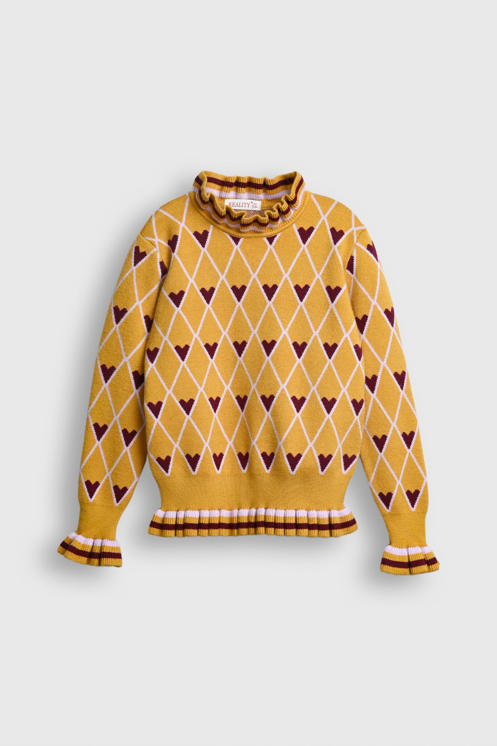 Golden Hearts Ruffle Sweater Reality