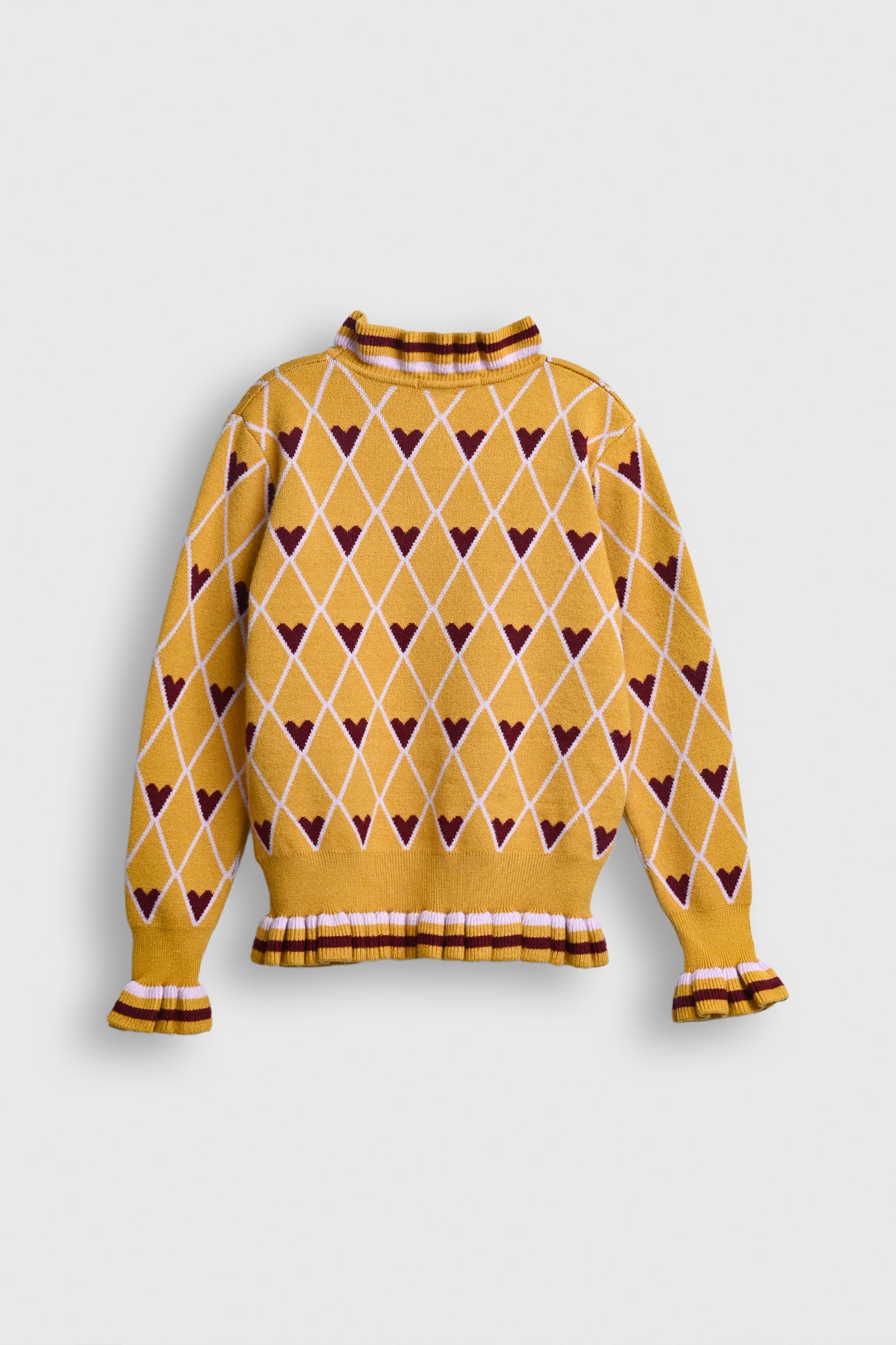 Golden Hearts Ruffle Sweater Reality