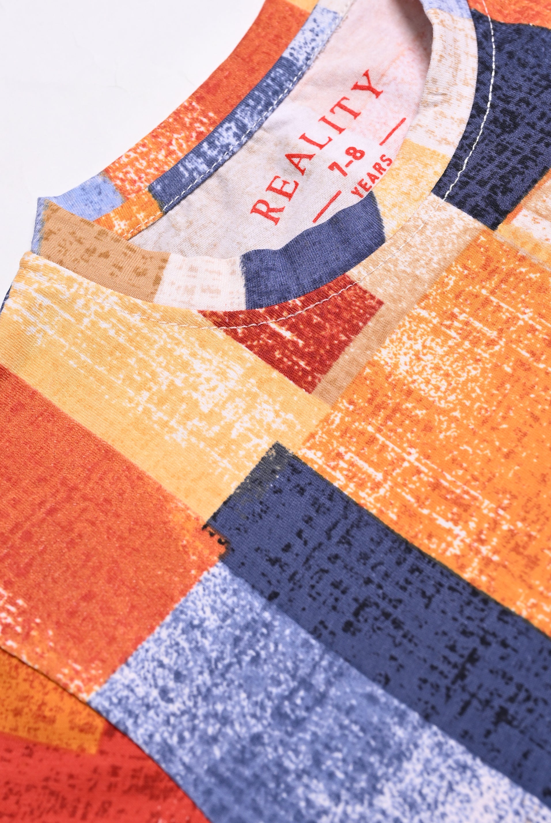 ORANGE PRINTED T-SHIRT Reality