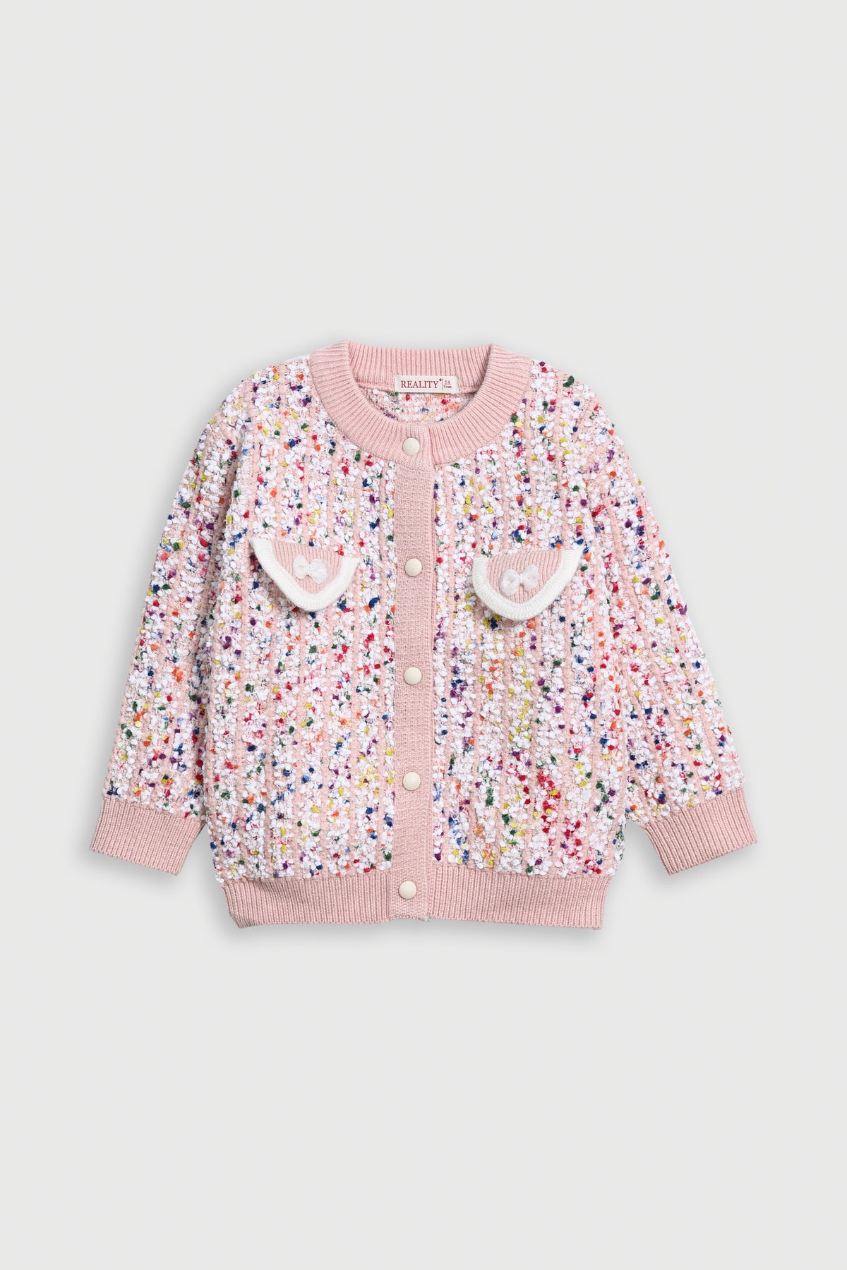 GIRL'S PEACH SWEATER Reality