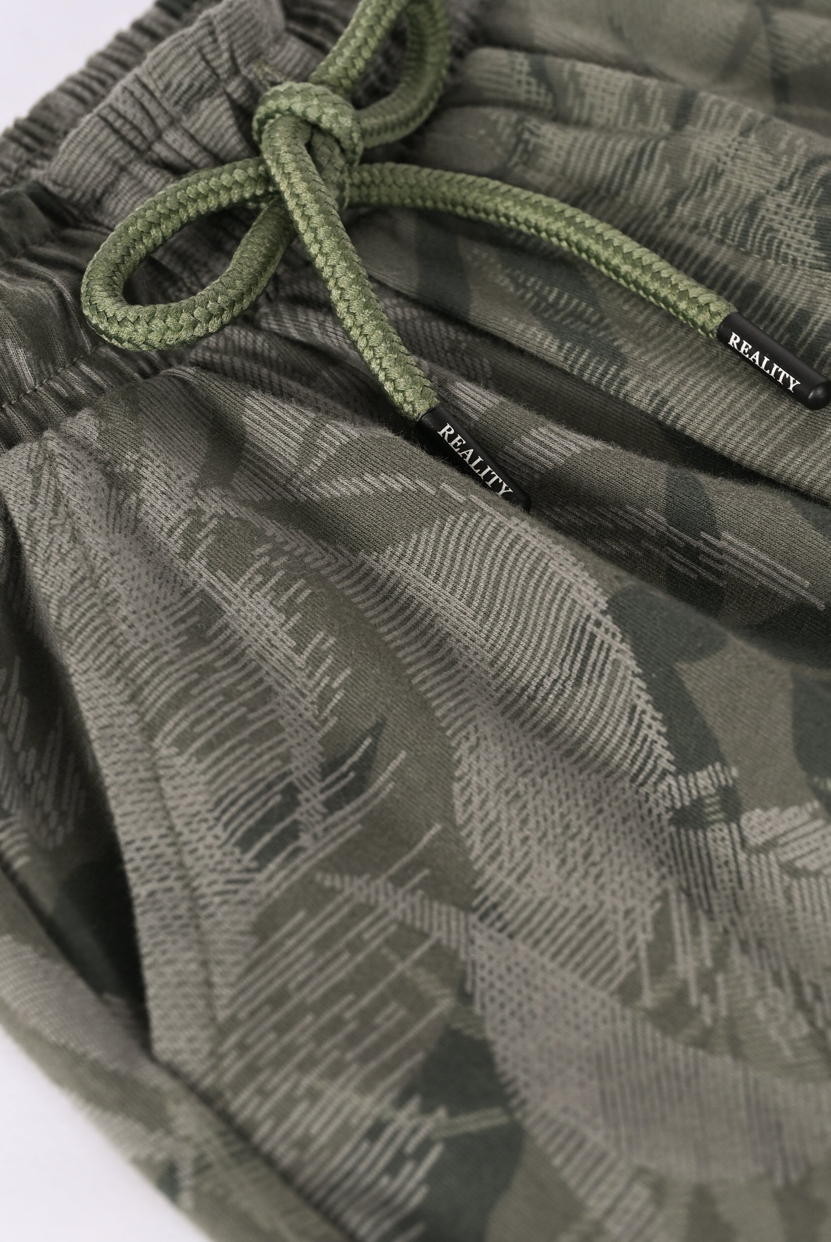 PRINTED GREEN SHORTS Reality