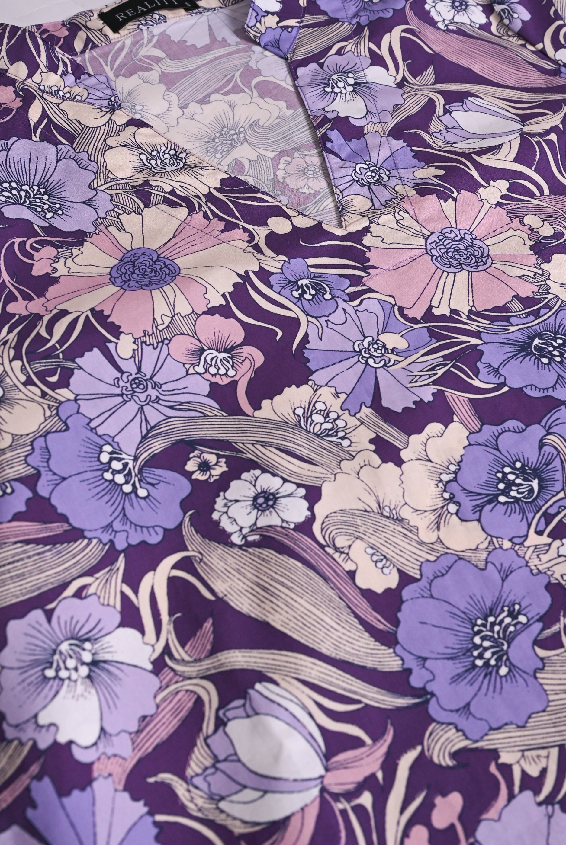 PURPLE FLORAL BLACK FROCK Reality