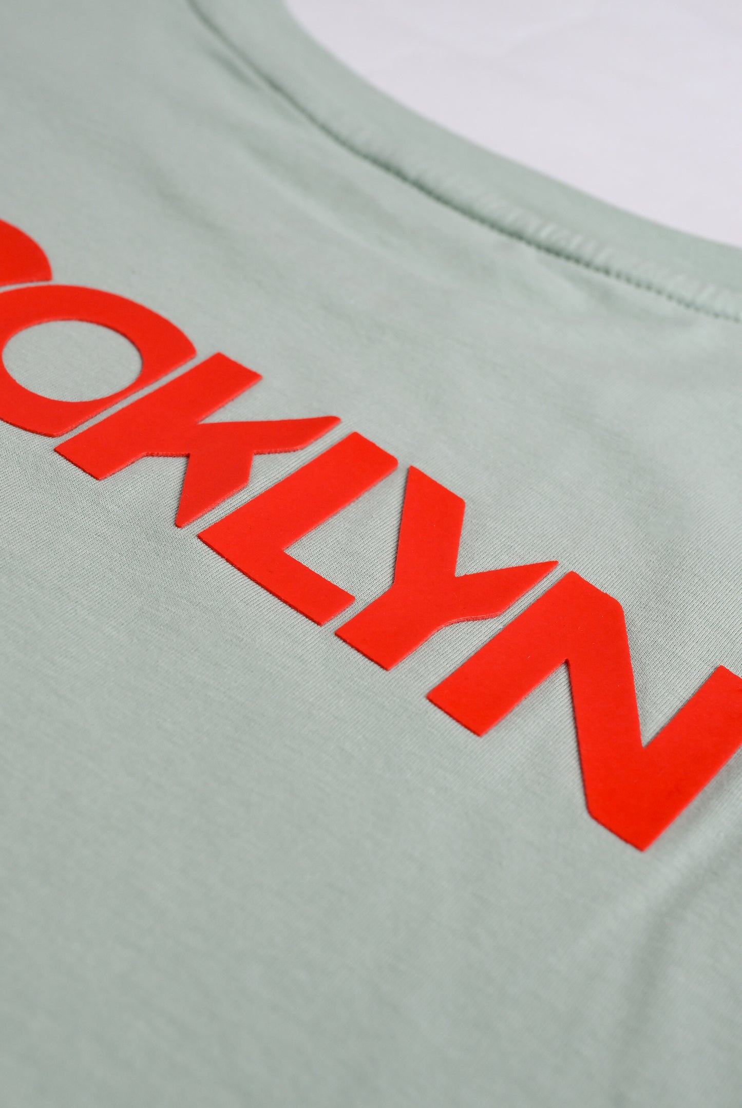 LIGHT GREEN LYCRA JERSEY BROOKLYN GRAPHIC TEE Reality