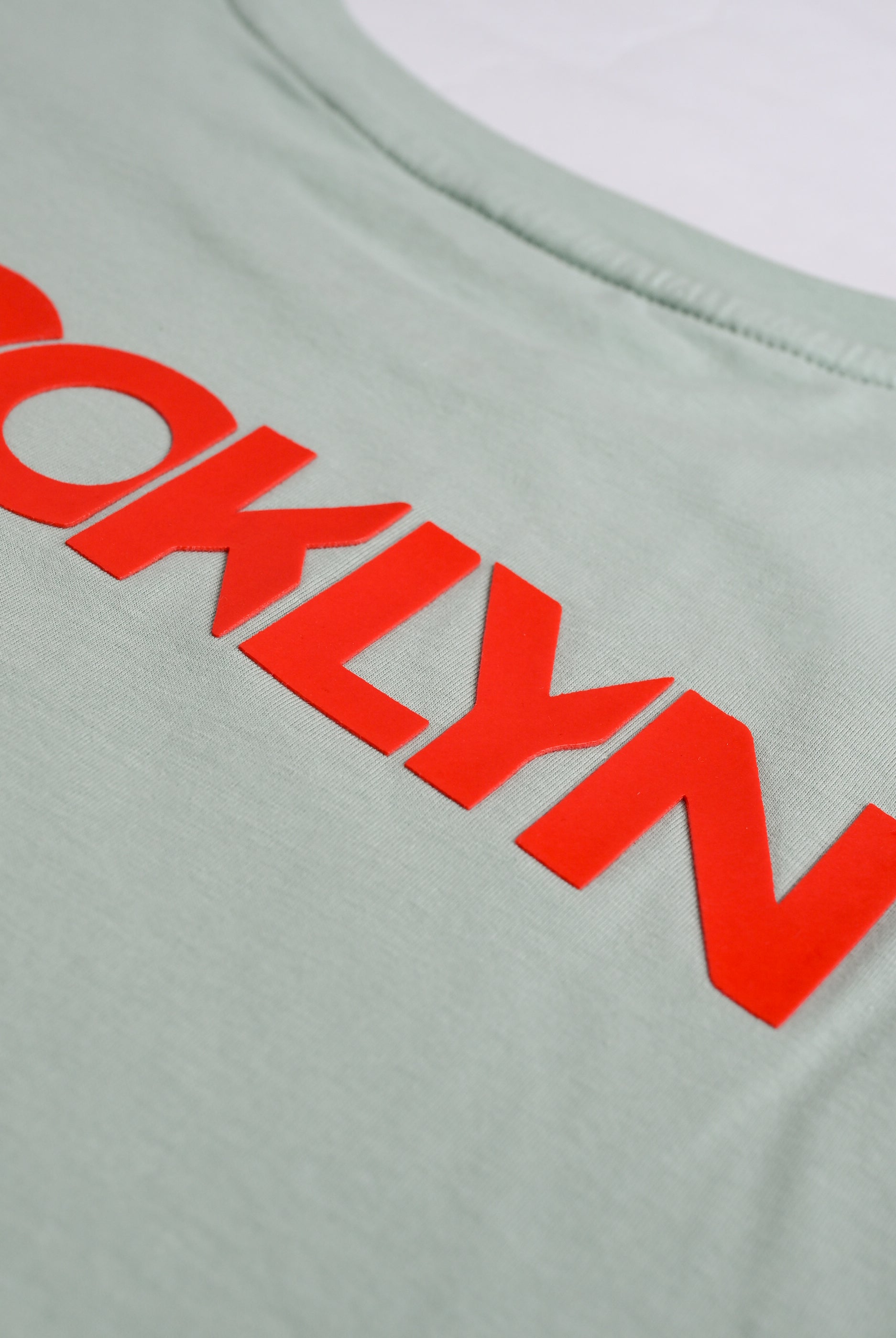 LIGHT GREEN LYCRA JERSEY BROOKLYN GRAPHIC TEE Reality