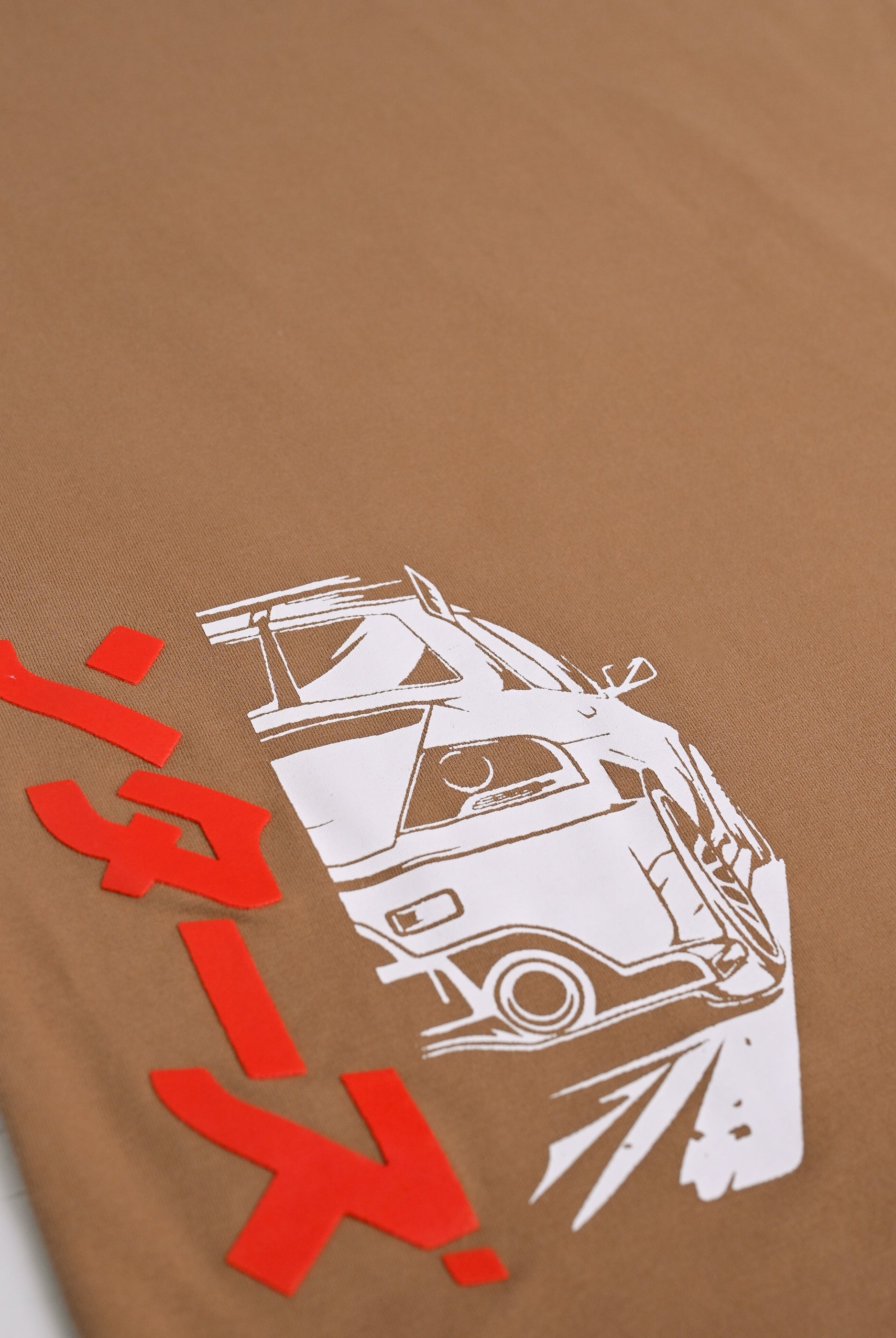 BROWN LYCRA JERSEY MOTO GRAPHIC TEE Reality