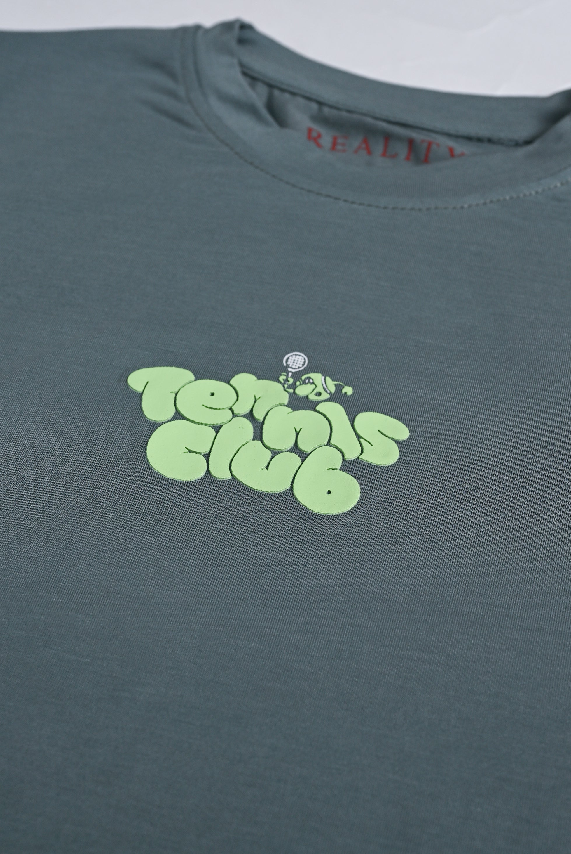 DINO GRAPHIC OLIVE TEE Reality