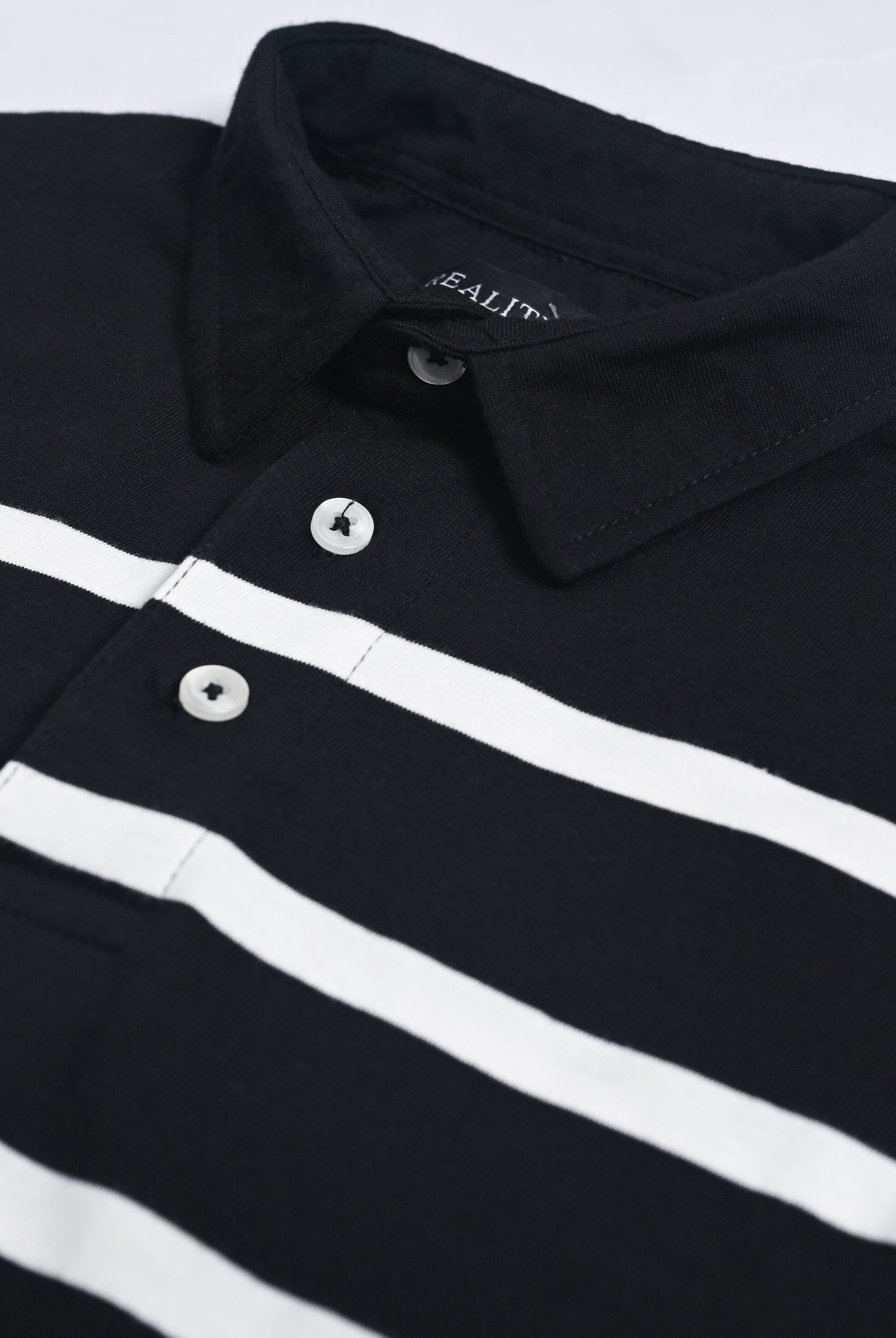 YARN DYED STRIPED BLACK POLO Reality
