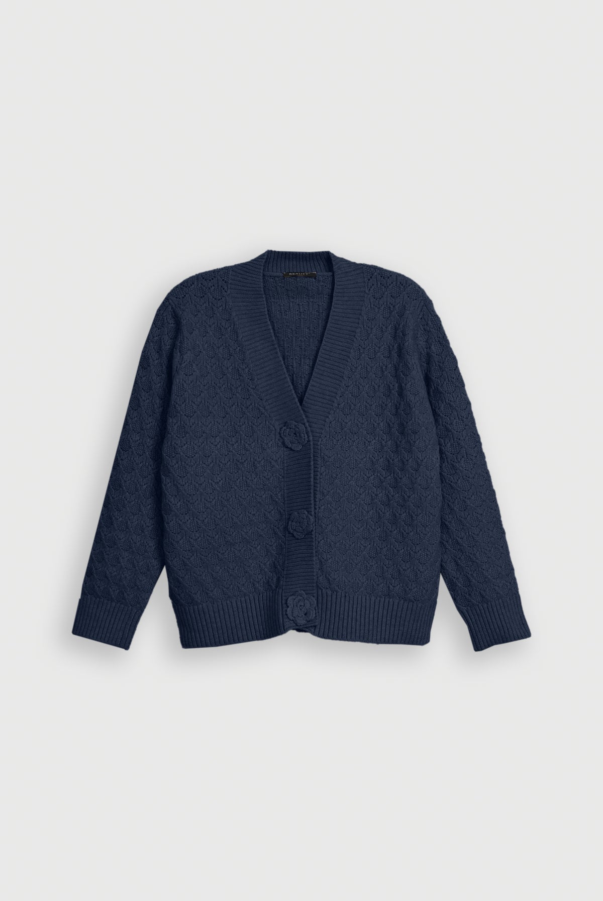 BLUE SWEATER Reality
