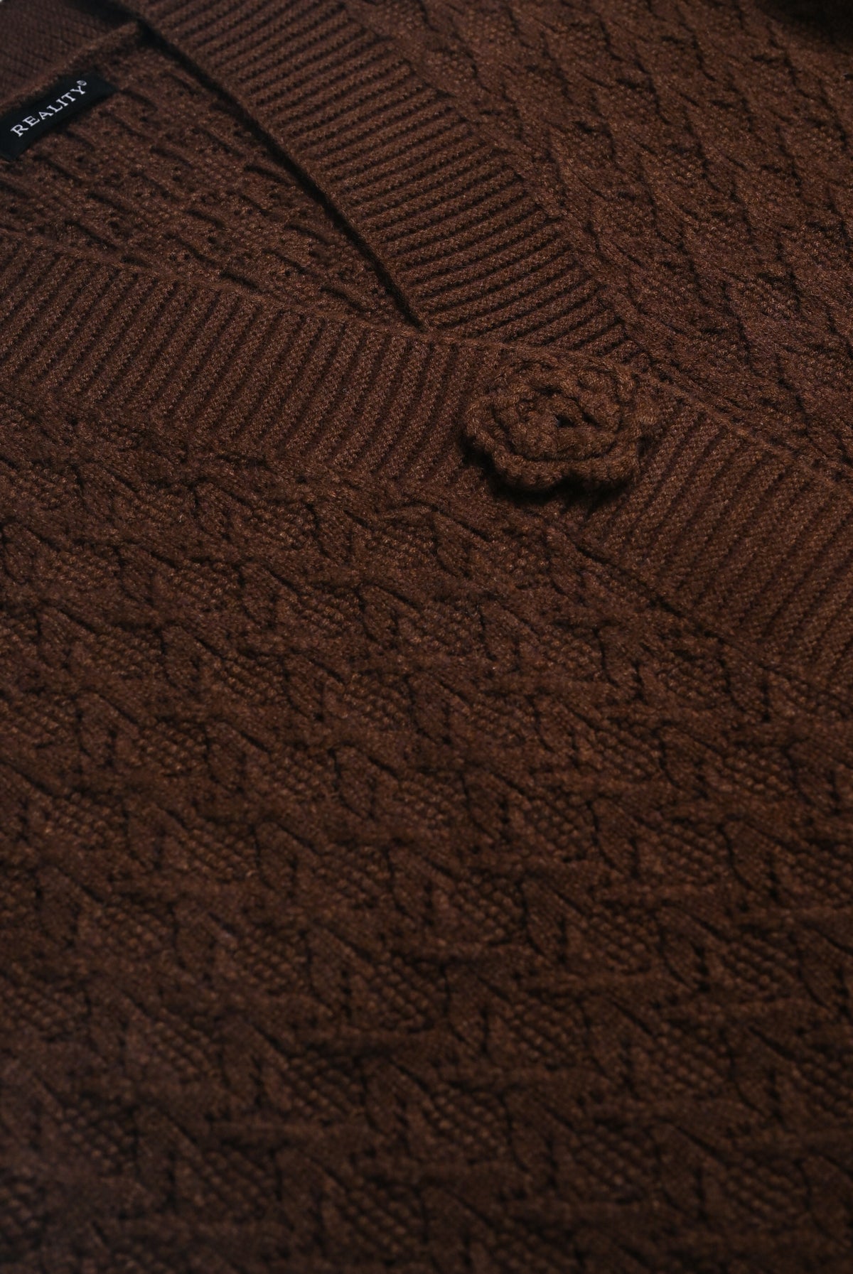 BROWN SWEATER Reality