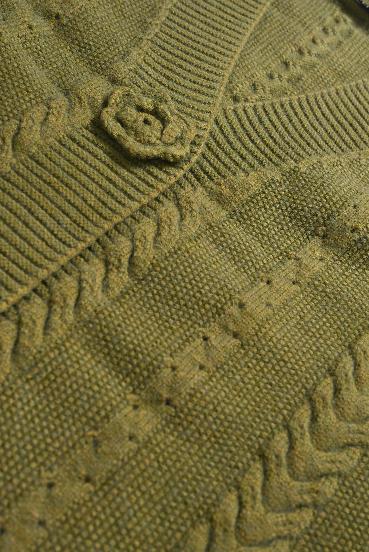 GREEN SWEATER Reality