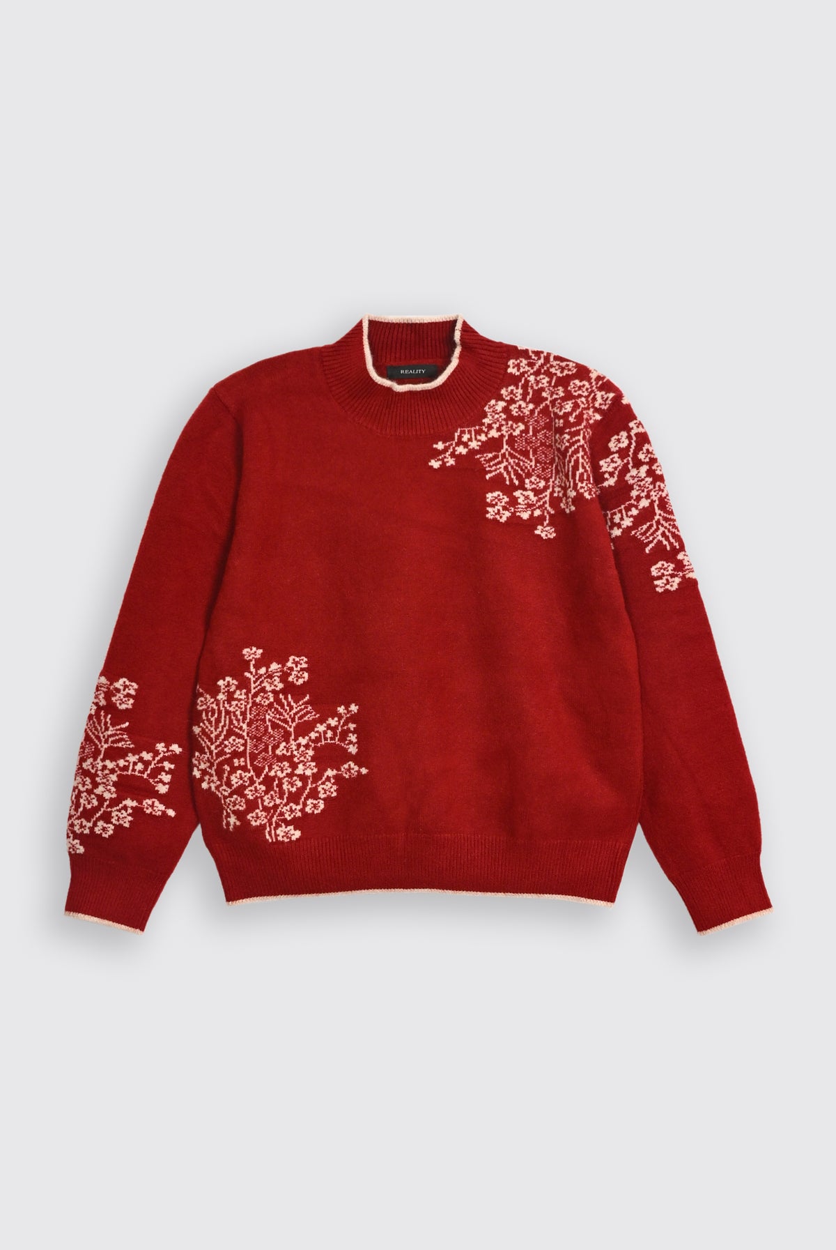 RED SWEATER Reality
