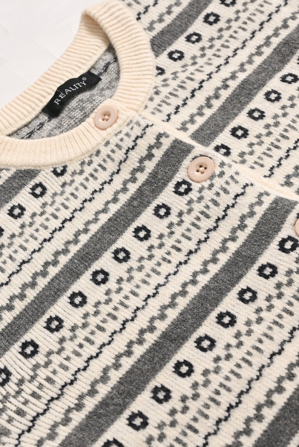 CREAM SWEATER Reality
