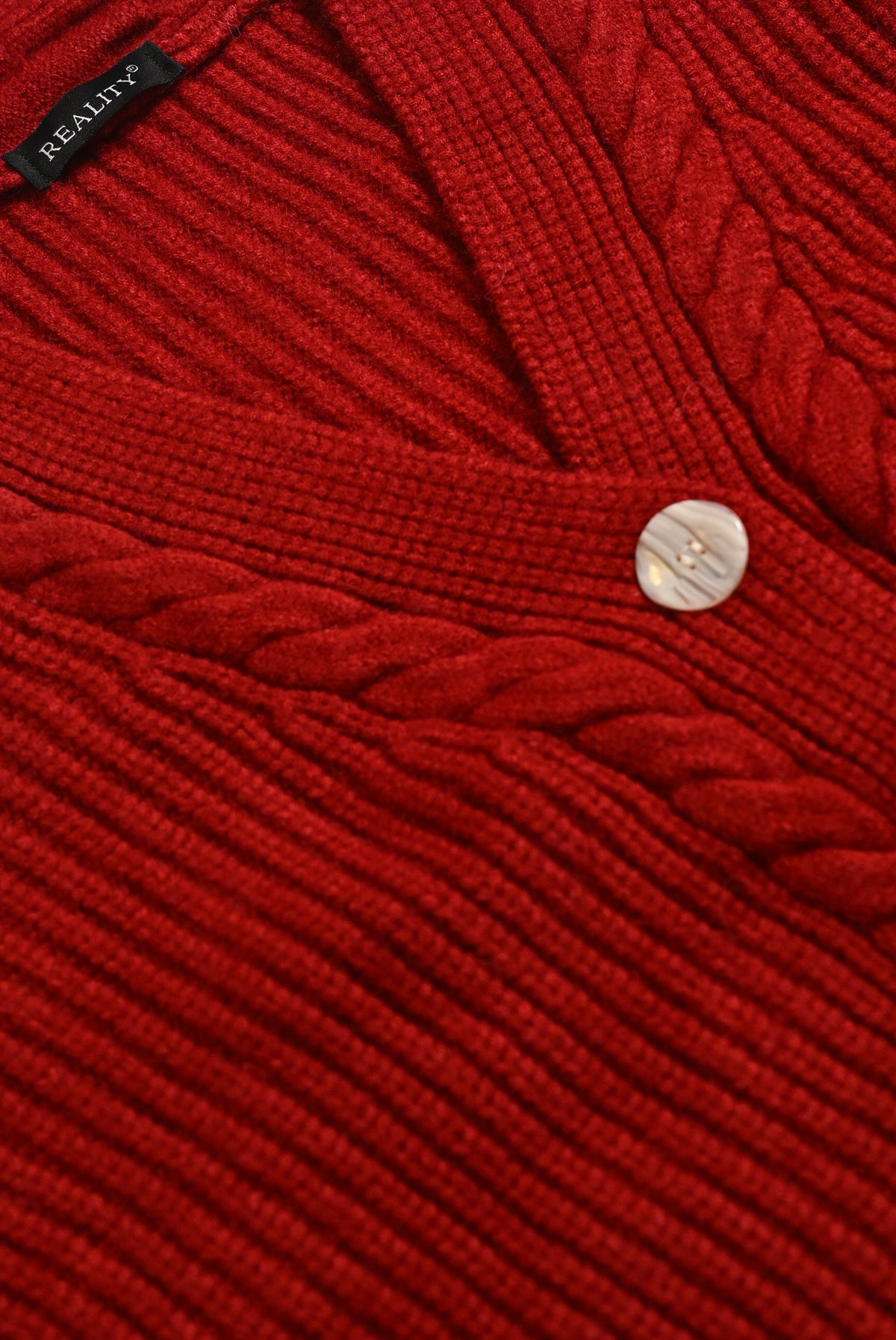 RED SWEATER Reality