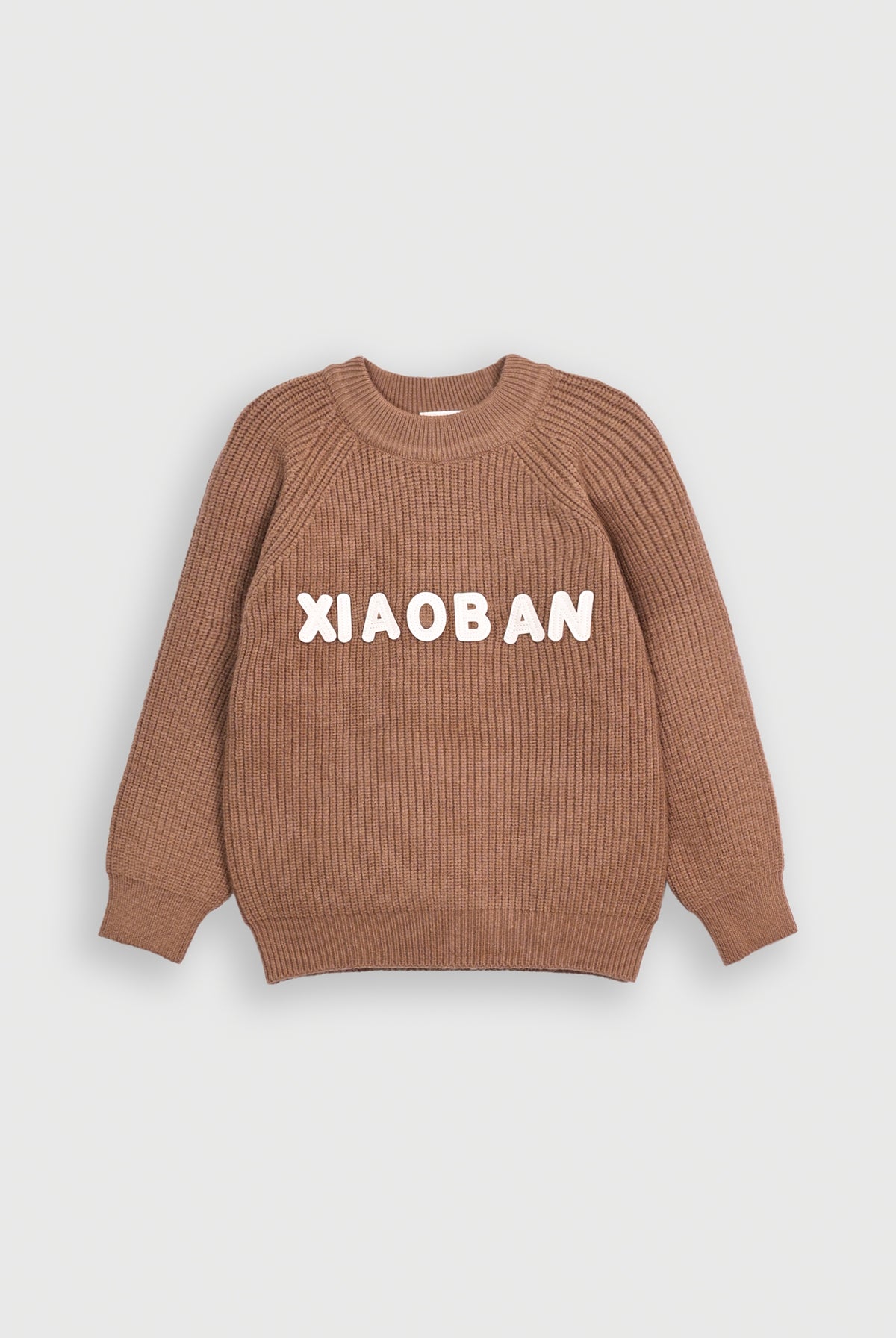 BROWN SWEATER Reality