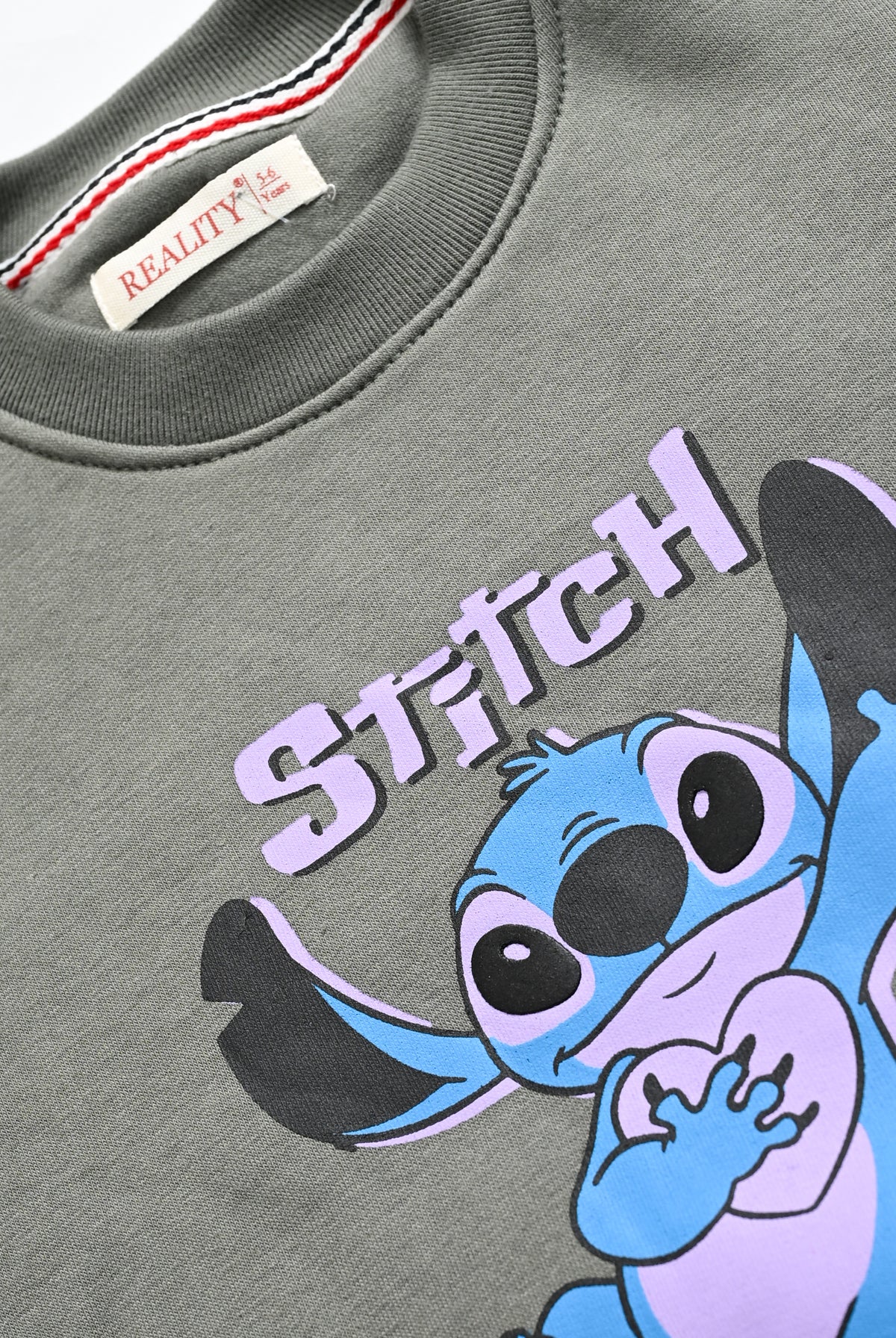 STITCH GRAPHIC GREEN SWEATSHIRT