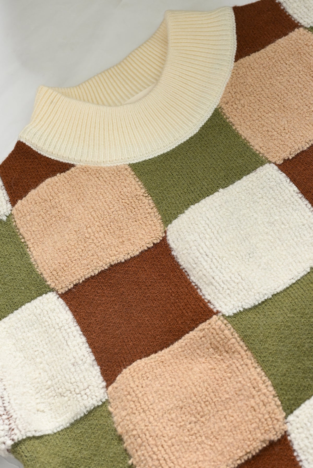 BEIGE SWEATER Reality