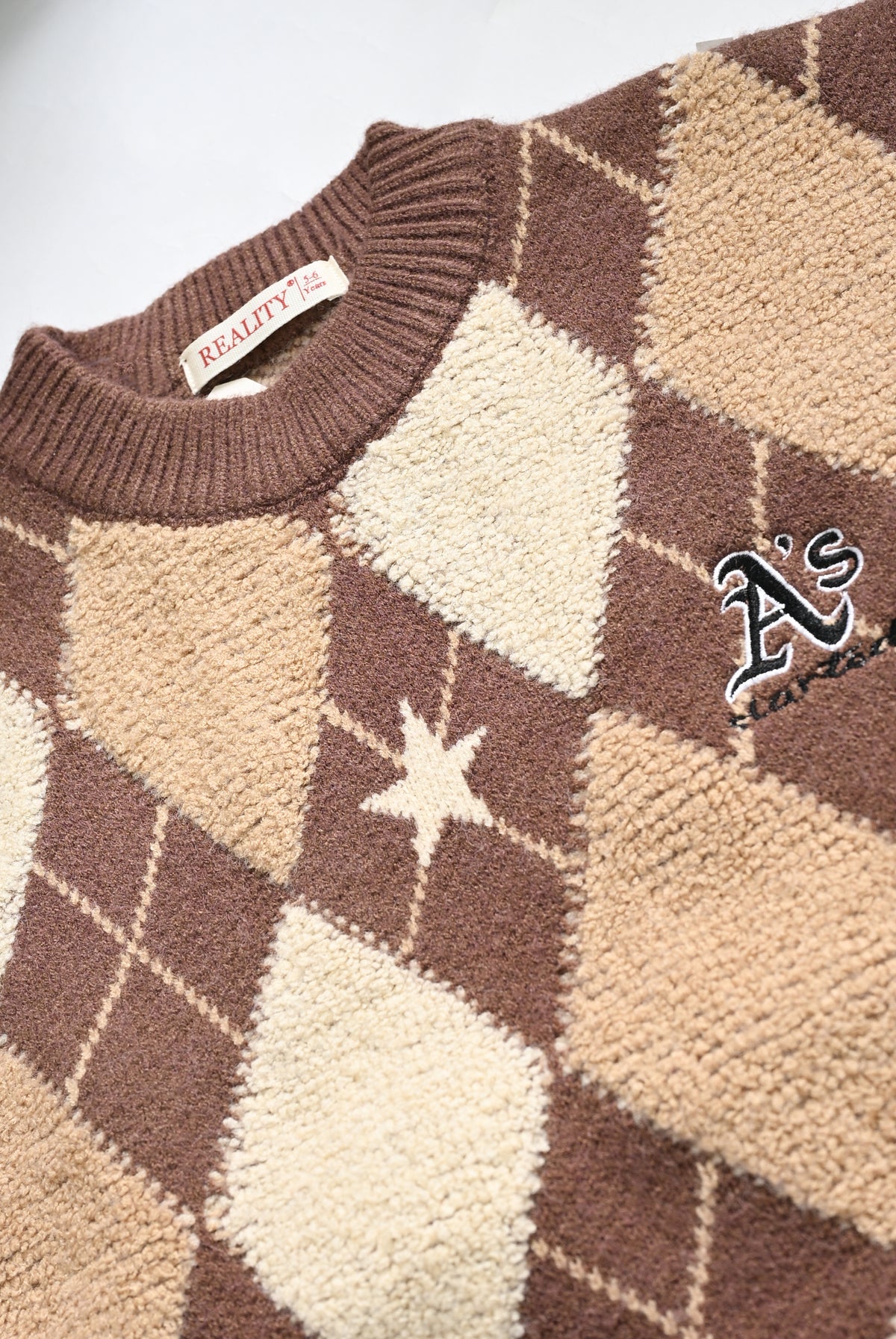 LIGHT BROWN SWEATER Reality