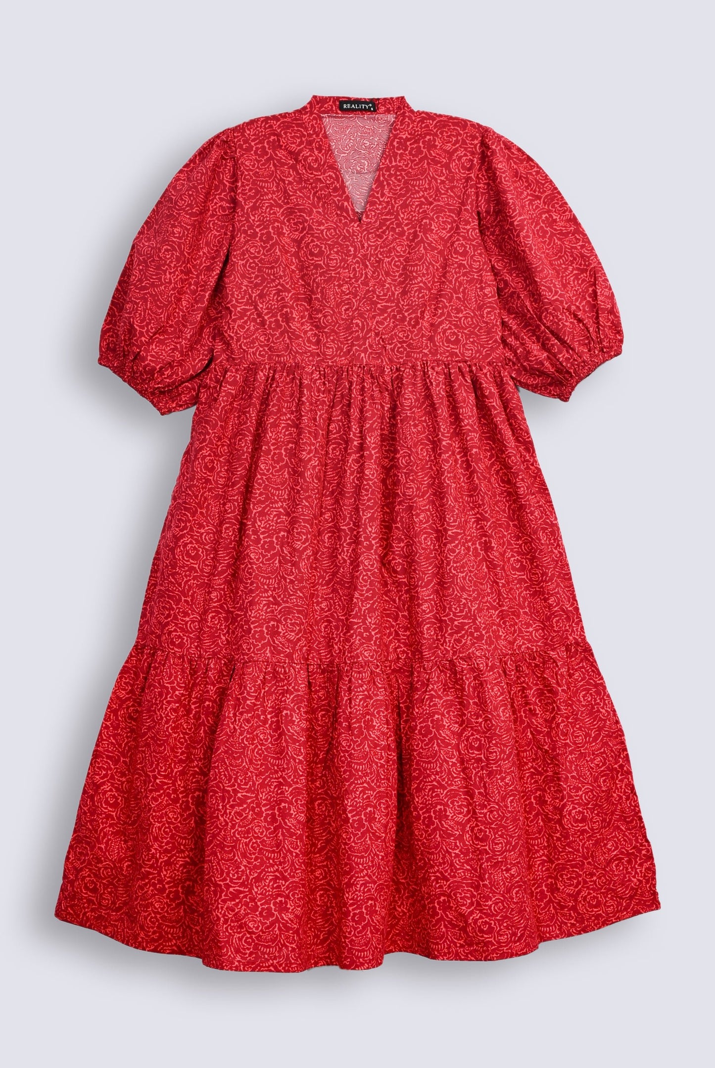 EMERALD SERENITY RED FROCK Reality