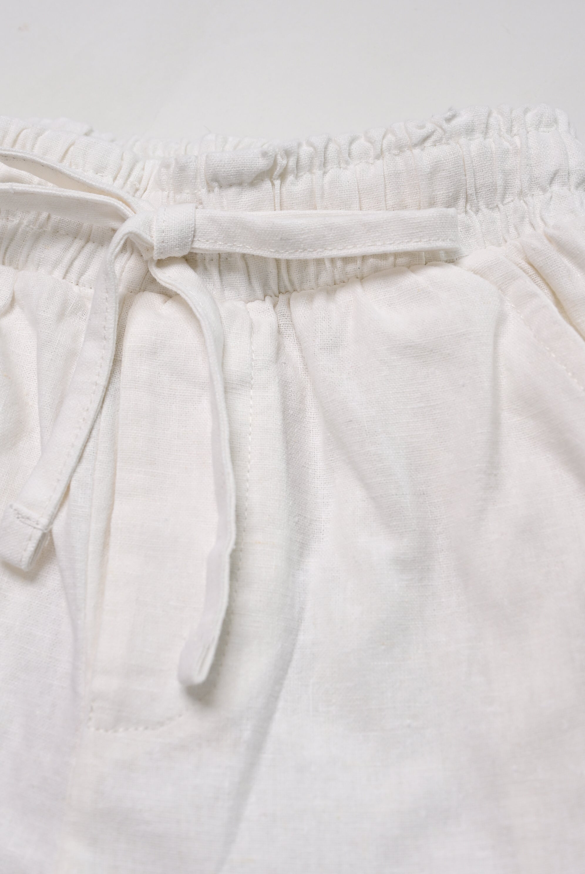 KIDS OFF WHITE SHORTS Reality