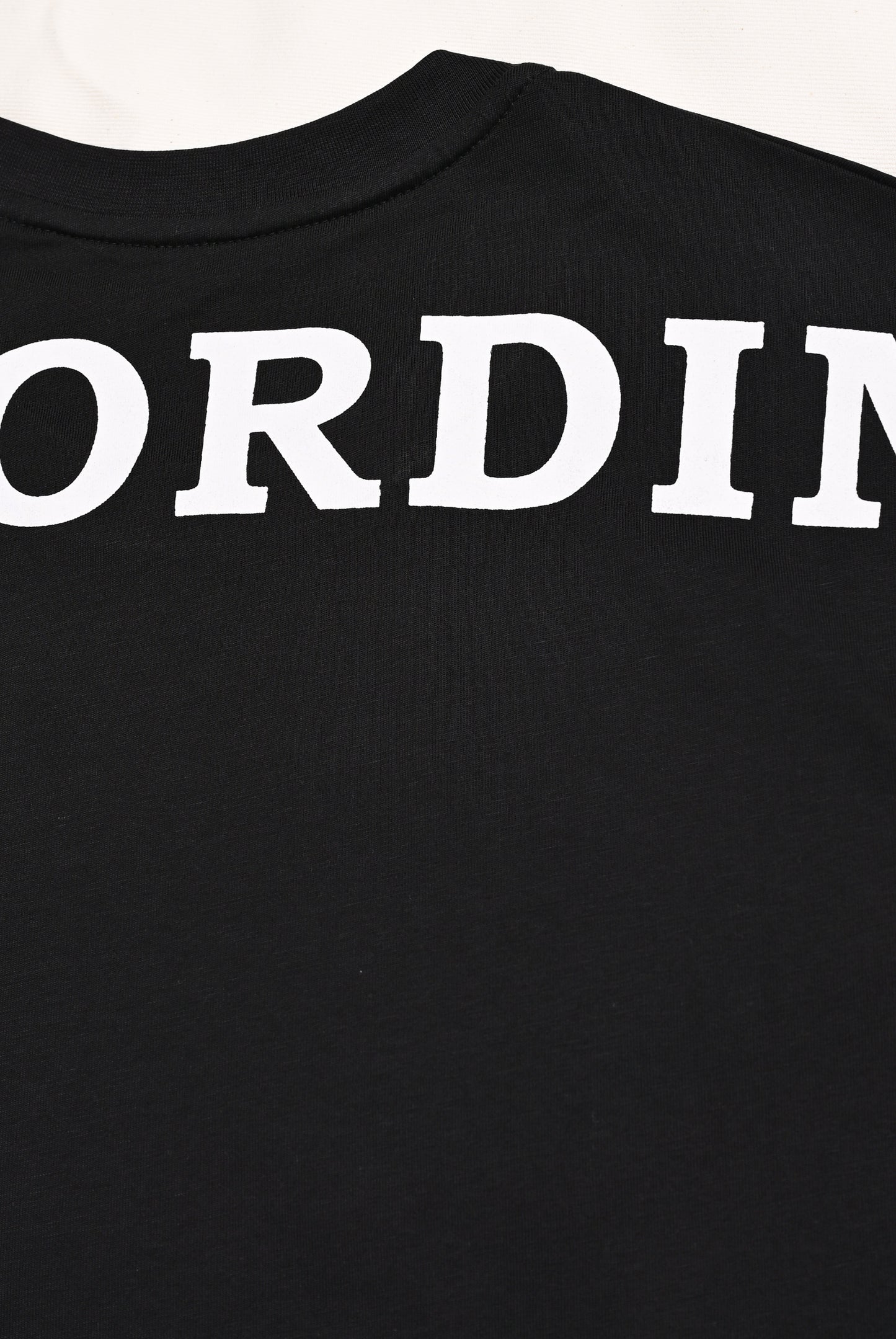 DROP SHOULDER PRINTED BLACK T-SHIRT Reality