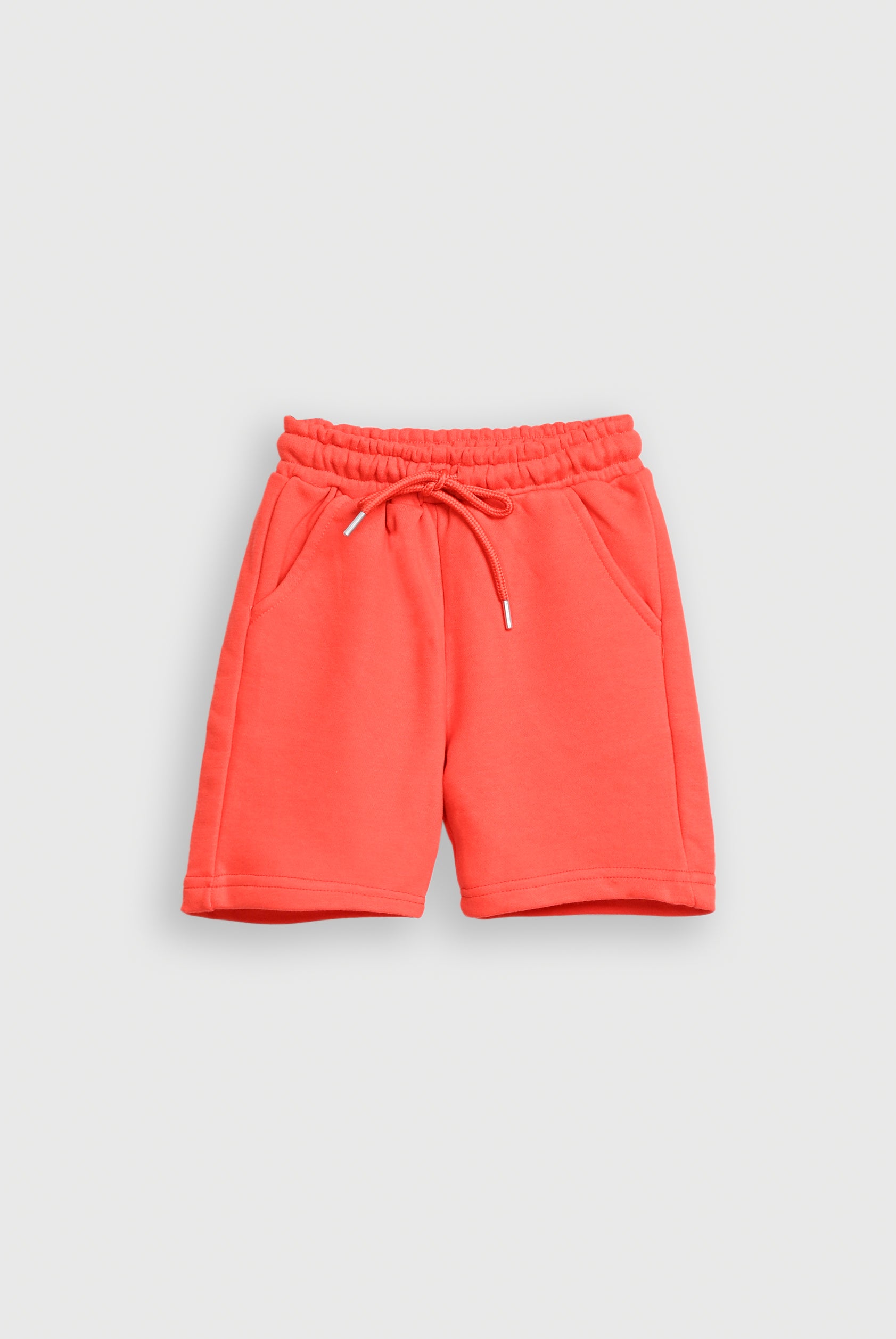KIDS ORANGE SHORTS Reality
