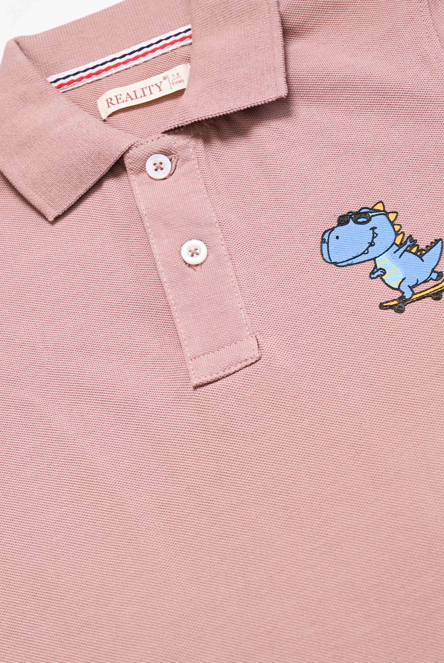 DINO PRINTED TEA PINK POLO Reality