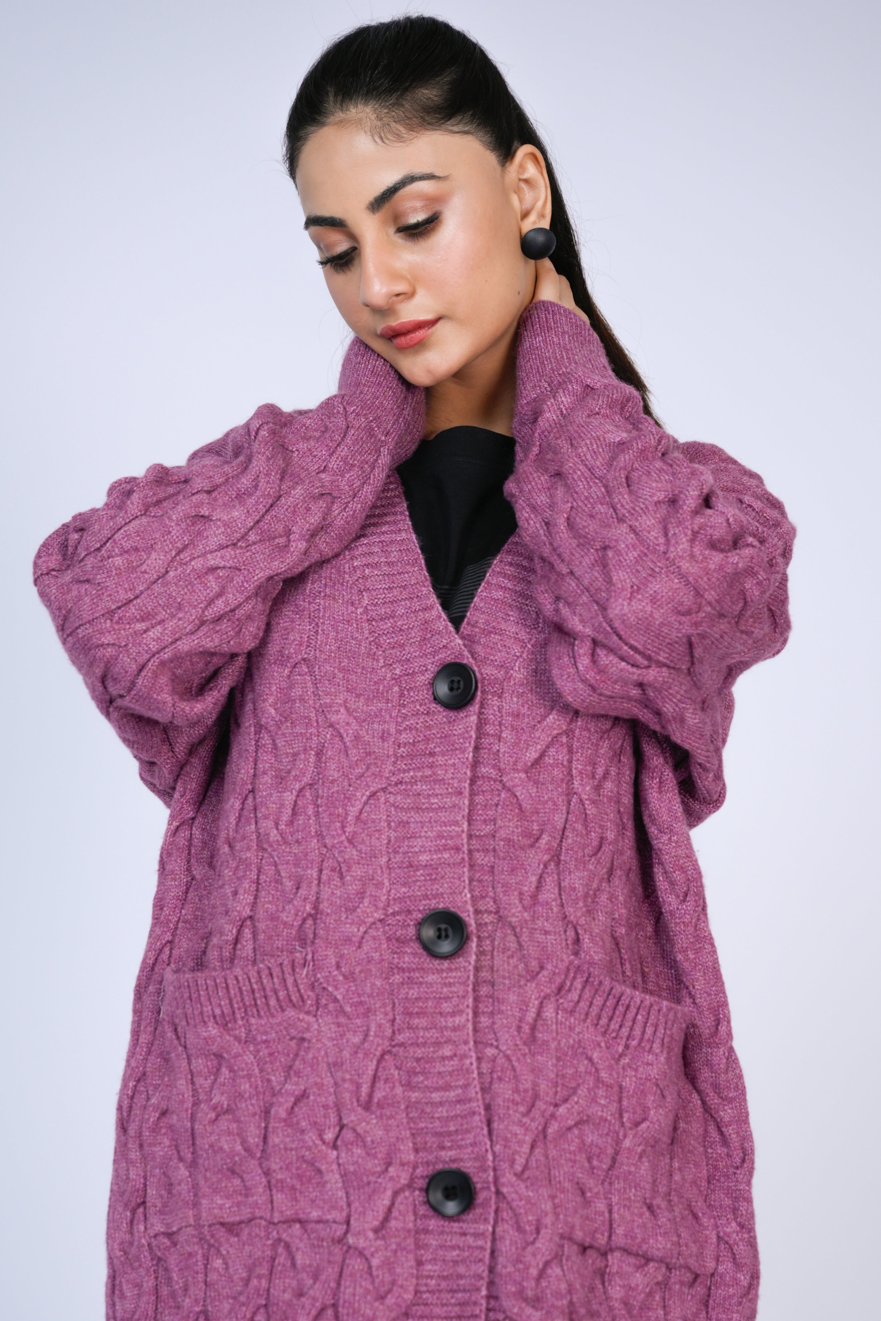 Textured Warmth: Cozy in Plum Knits Reality