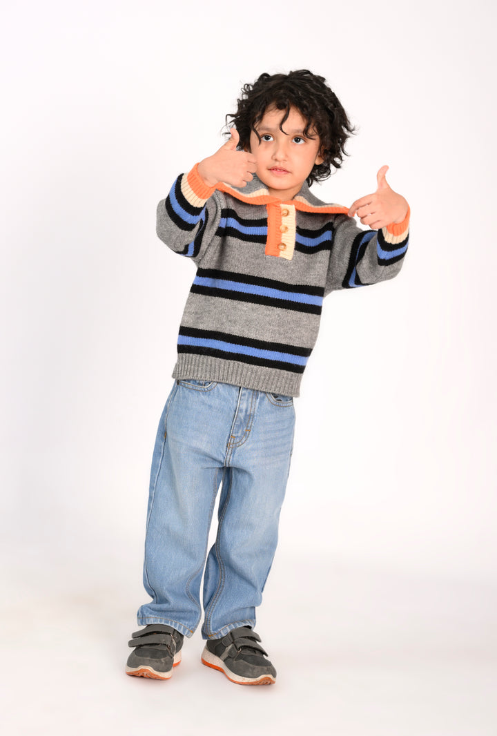 Boy in a Striped Sweater and Light Wash Jeans Reality
