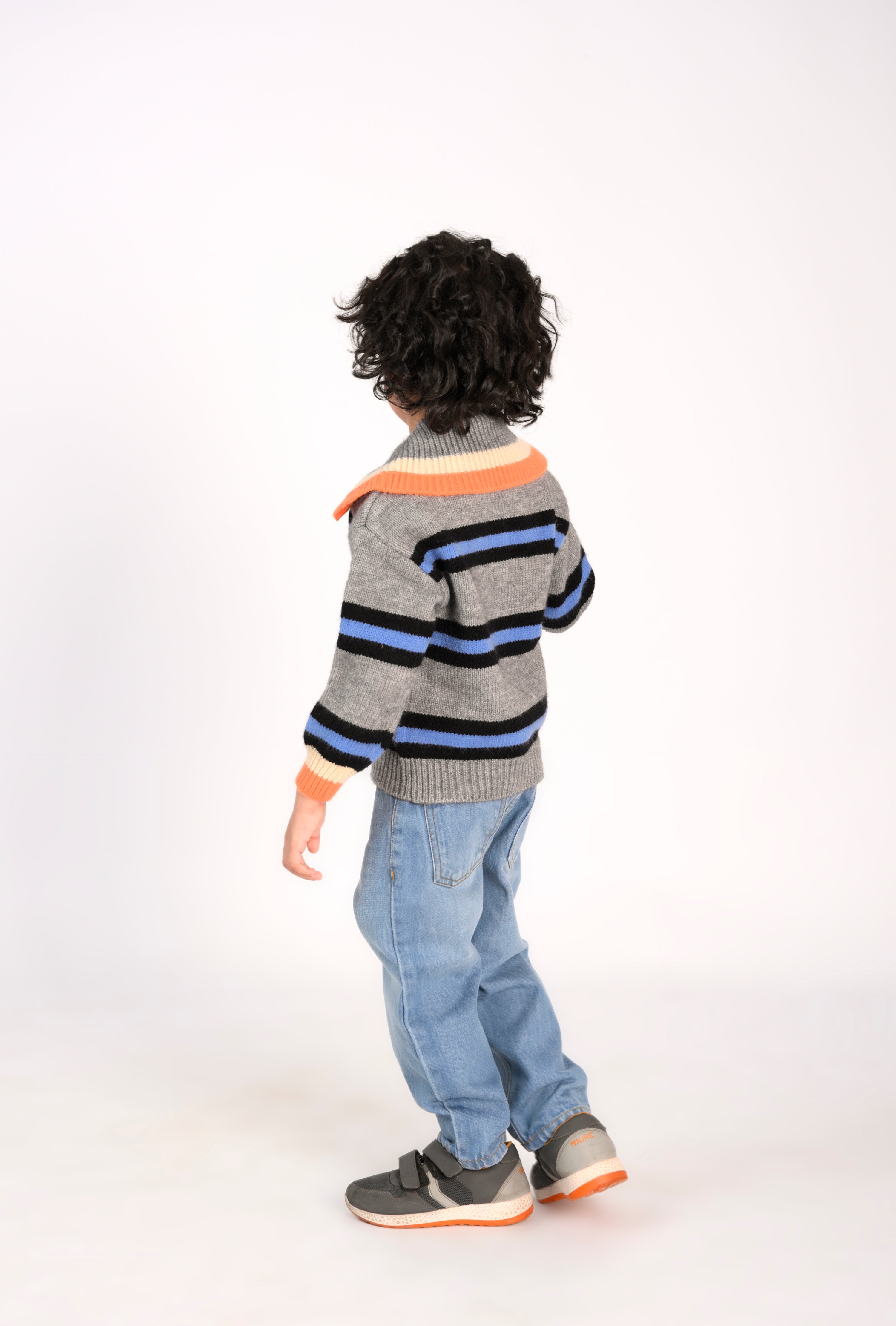 Boy in a Striped Sweater Reality