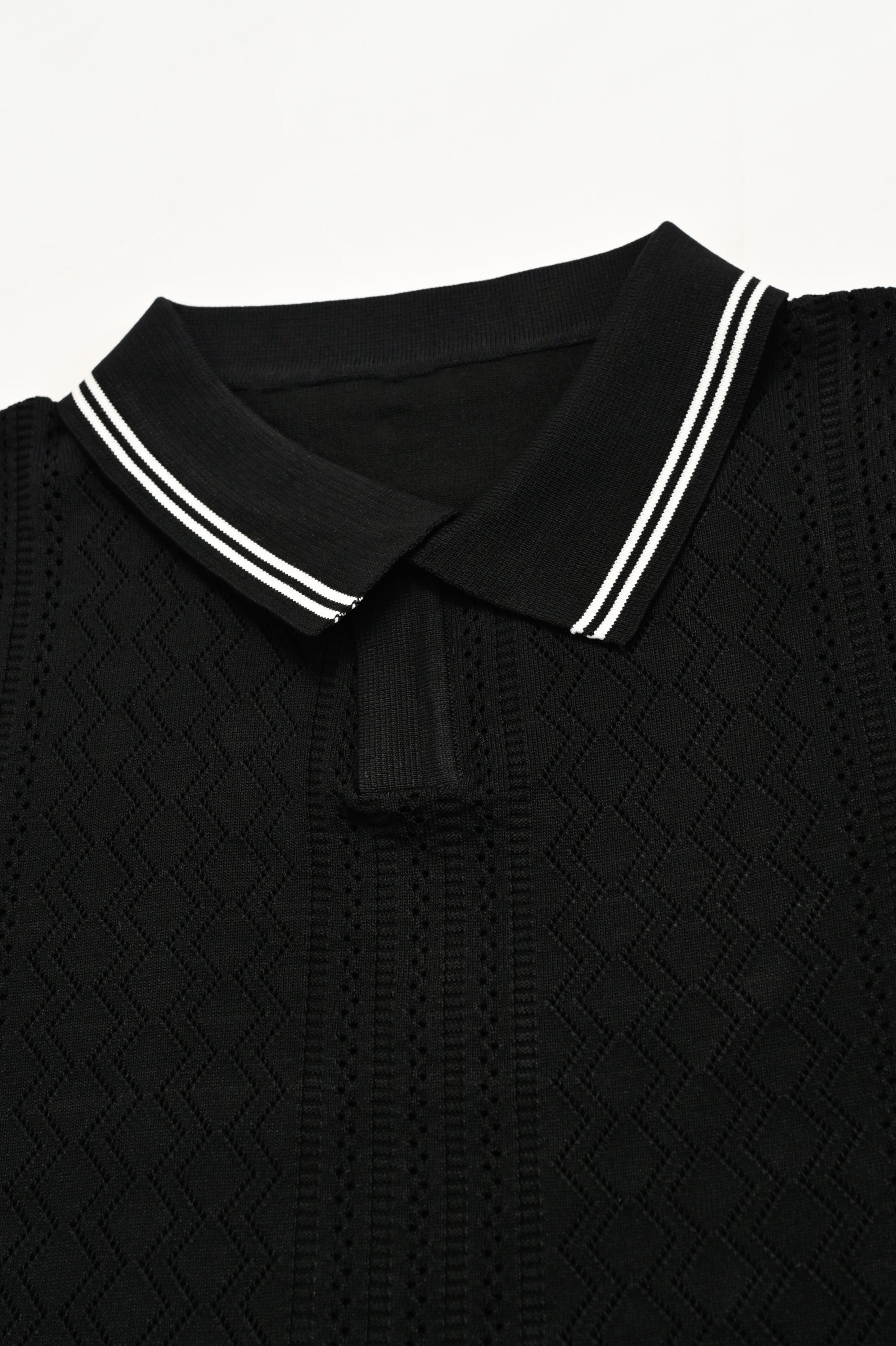 IMPORTED KNITTED BLACK POLO Reality
