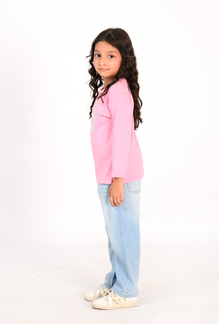 Young Girl in Pink "Bloom with Grace" Shirt and Light Wash Jeans Reality