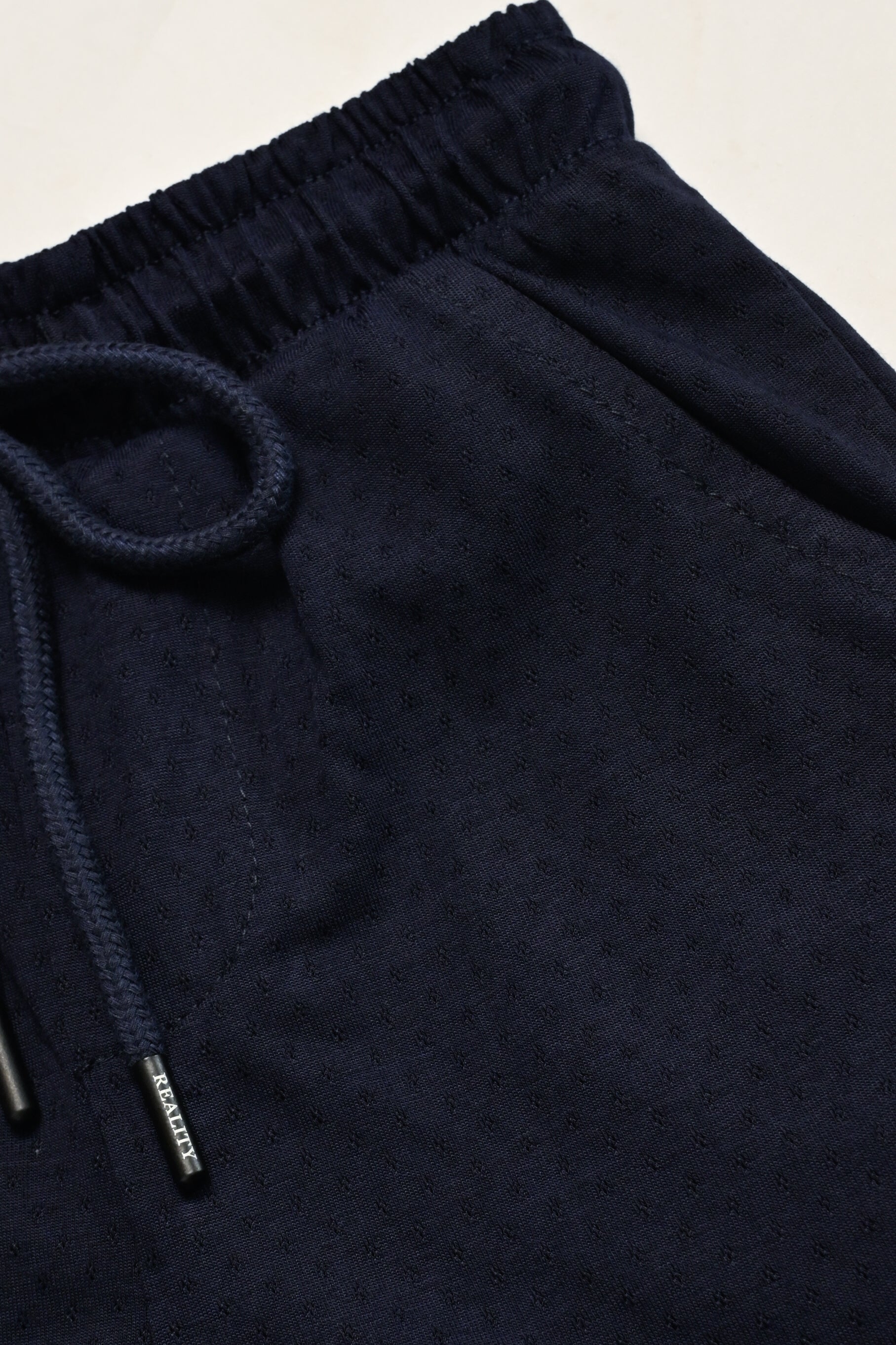 PRINTED NAVY SHORTS Reality