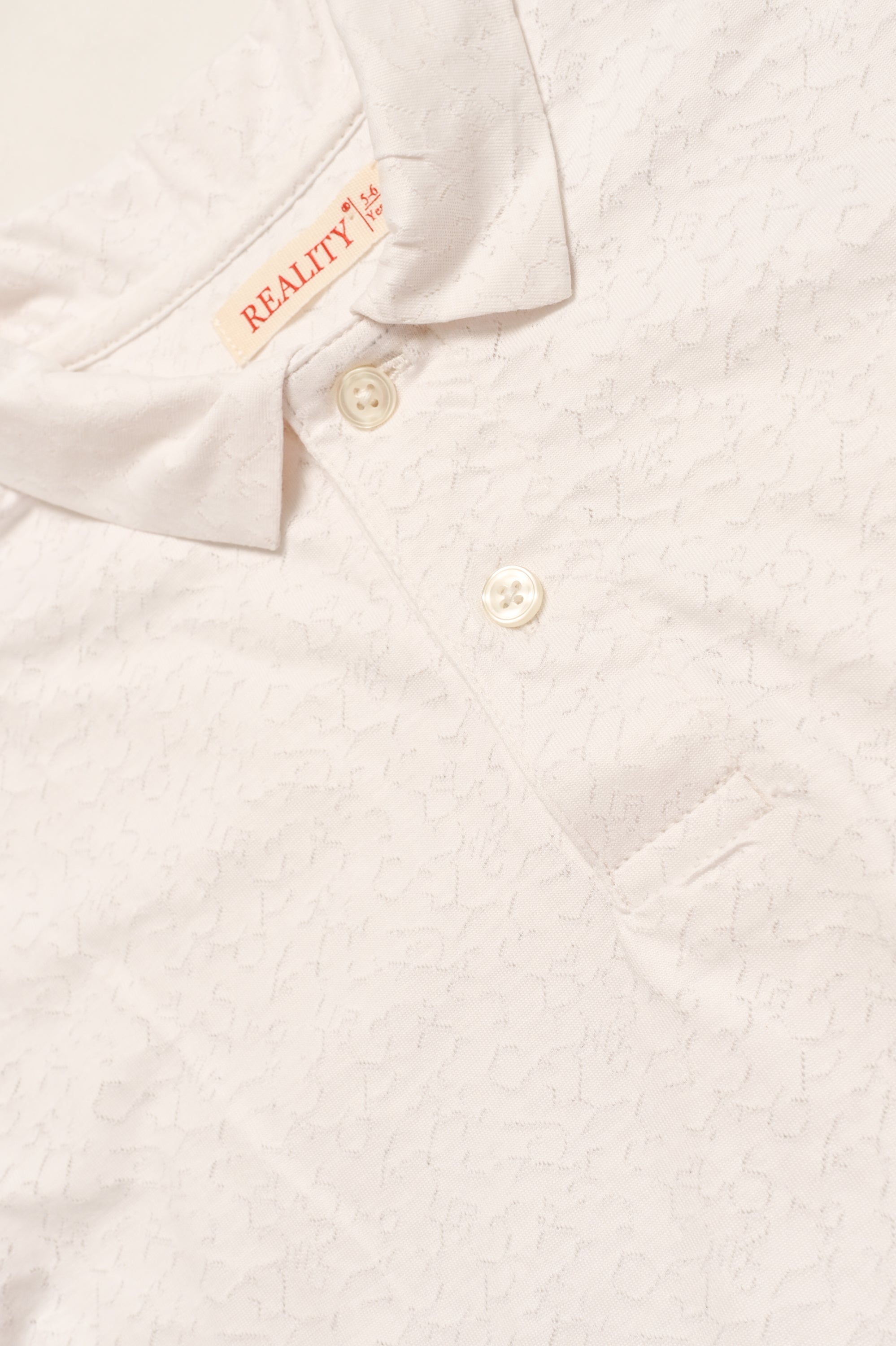 BOY PRINTED OFF WHITE POLO Reality