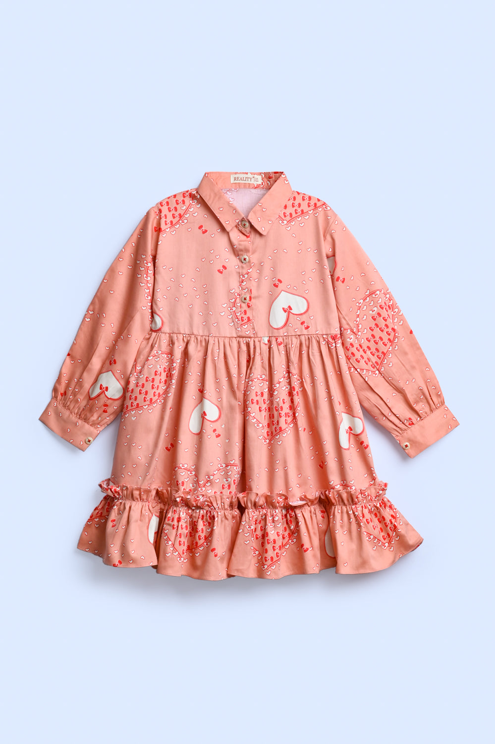 BLUSH AND BOWS PEACH TOP Reality