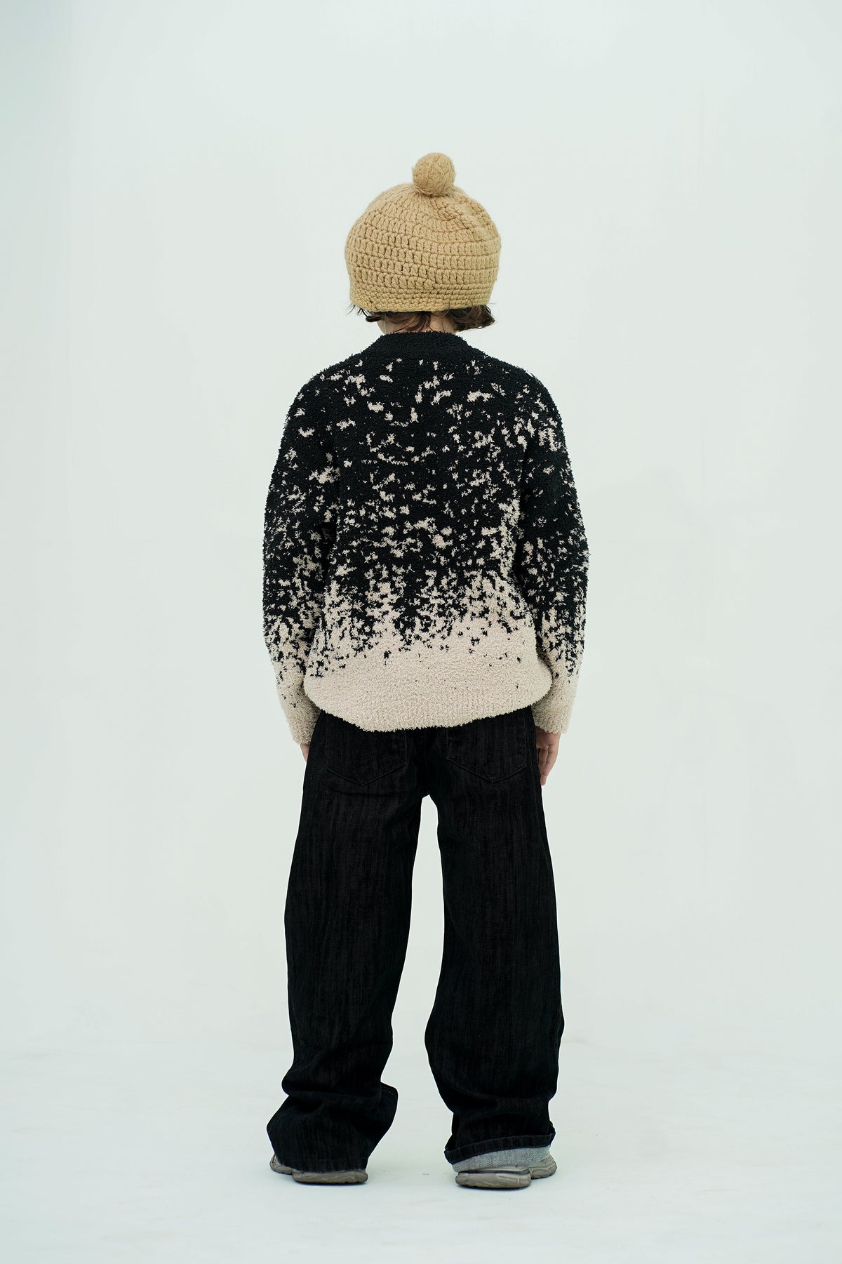 BLACK SWEATER Reality