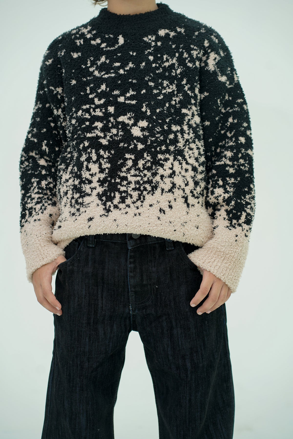 BLACK SWEATER Reality